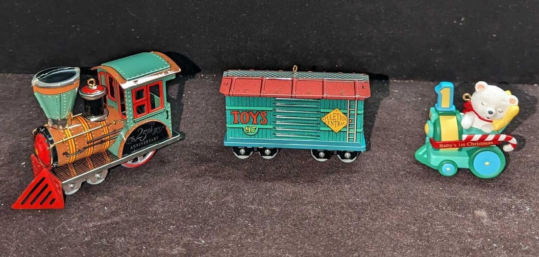 3 Hallmark Train & Baby's First Christmas Ornaments: 3 Hallmark Train & Baby's First Christmas Ornaments. This lot includes: (1) Hallmark Keepsake Ornament - Baby's First Christmas. This was designed by John "Collin" Francis and was