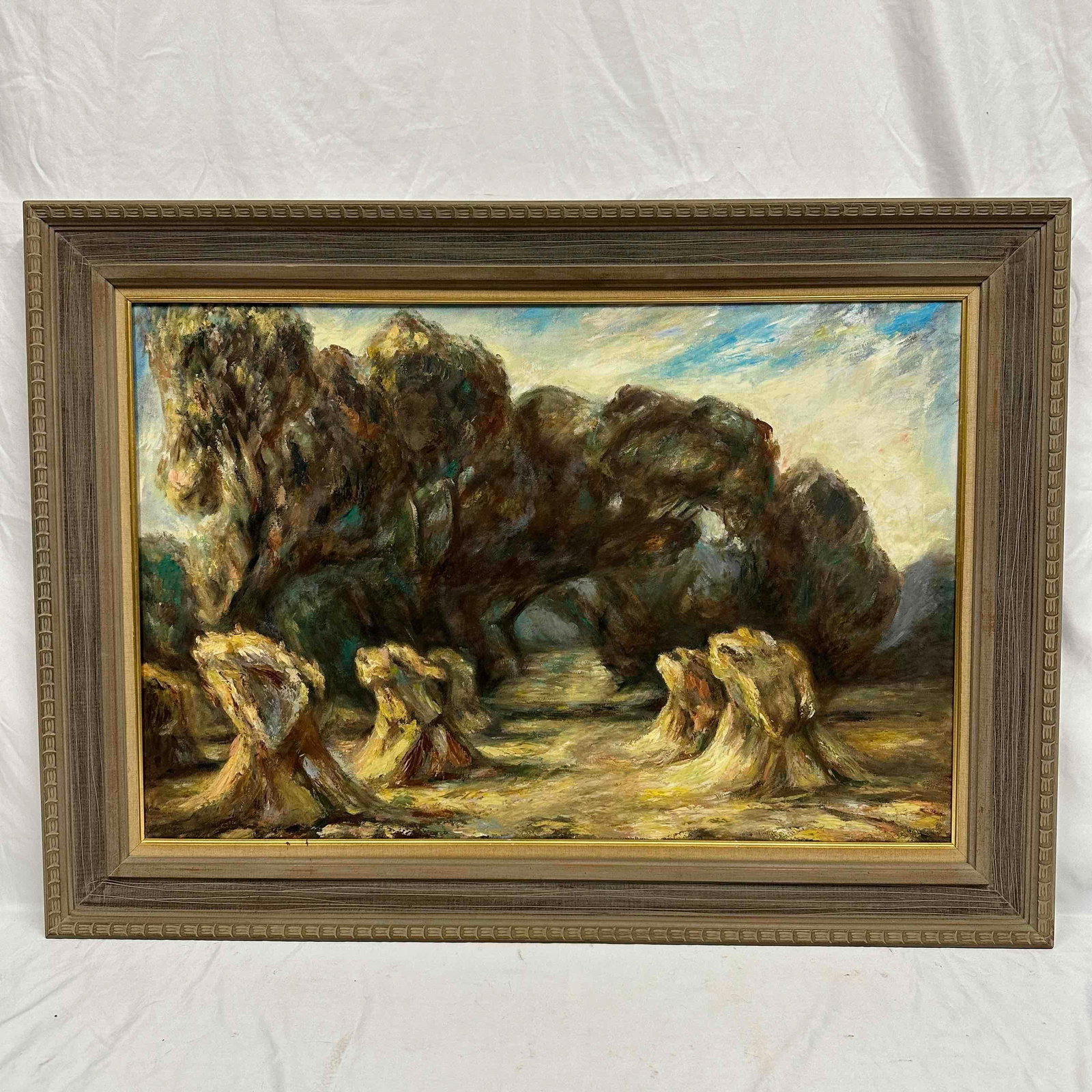 Haystacks and Trees Landscape Rural Scene Painting Framed Oil on Canvas Medium R152: This beautifully framed oil painting represents a serene landscape in the Impressionist style. Rich in texture and color, the artwork captures a scene of haystacks under a canopy of trees, with light 