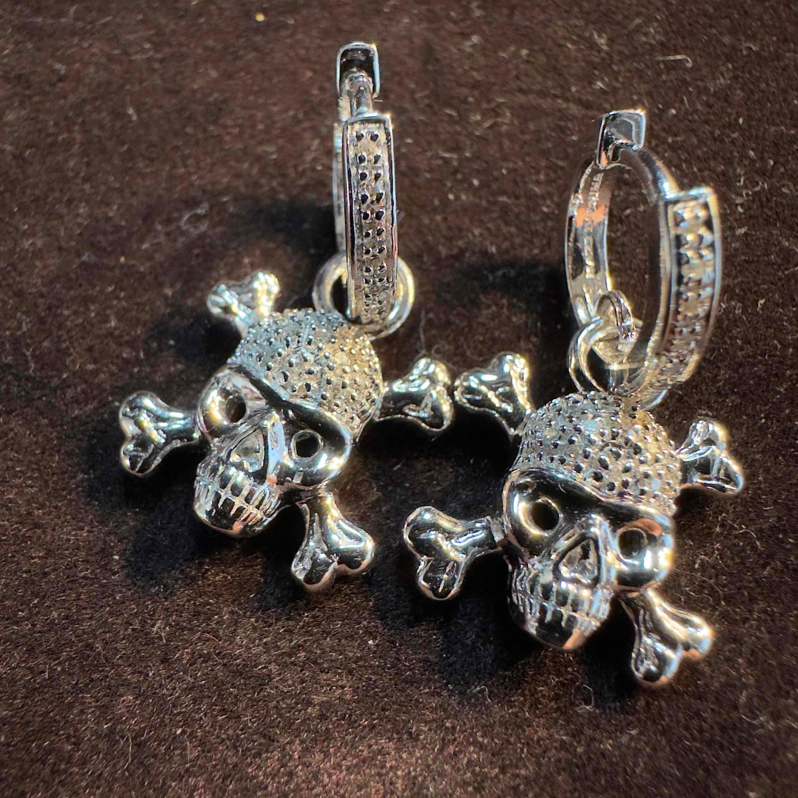 Diamond Cross Bones Skull Sterling Silver Dangle Earrings: This item is in good pre-owned, previously used/displayed condition with noticeable light wear, and surface scratches. Please reference all photos for full details. This piece of jewelry has been test