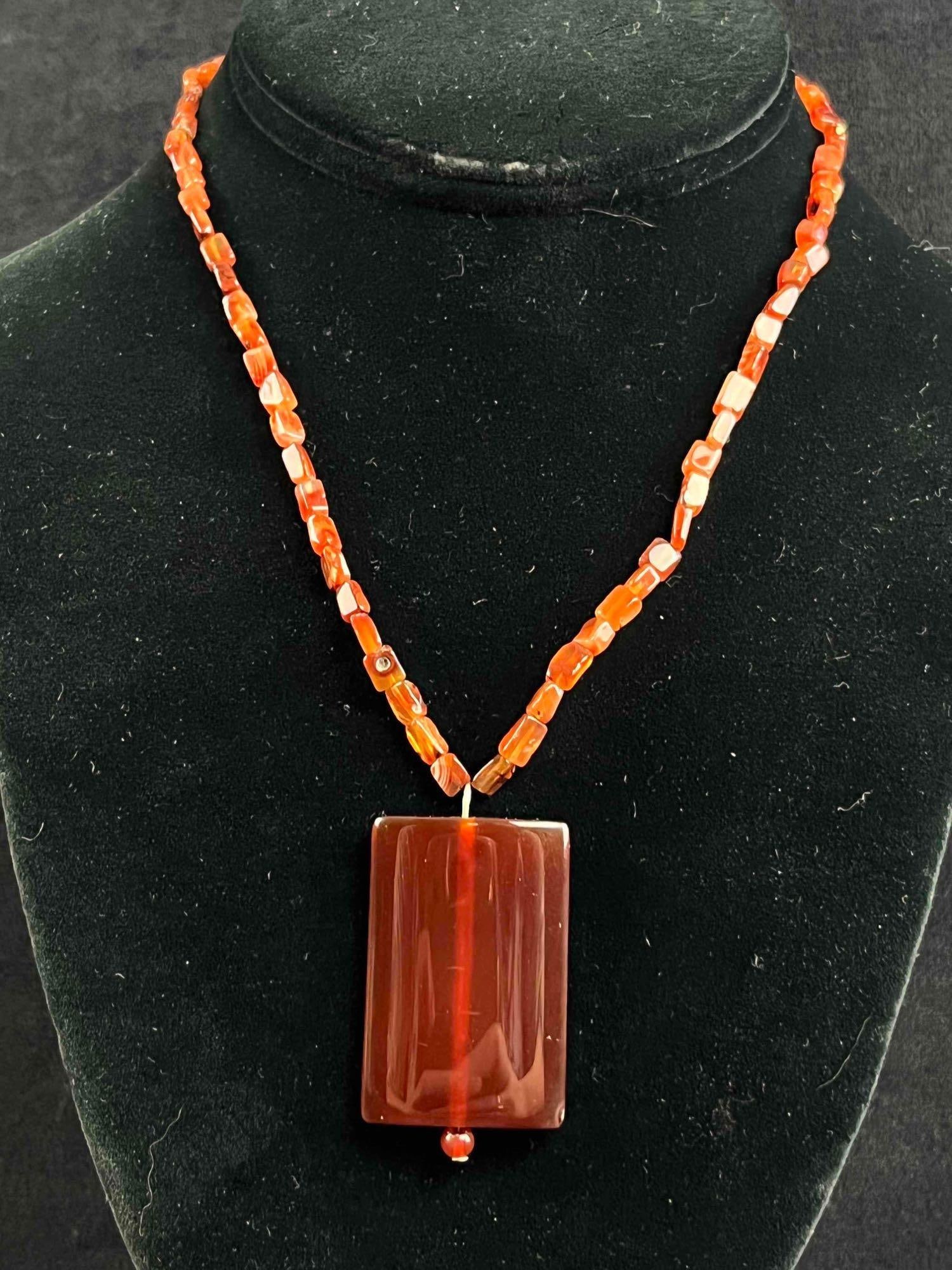 Red Coral Necklace Sterling Silver Coral Necklace: Red Coral Necklace Sterling Silver Coral Necklace This beautiful necklace is made from polished red coral beads on a sterling silver wire with a sterling silver clasp. This is a handmade piece by jewe
