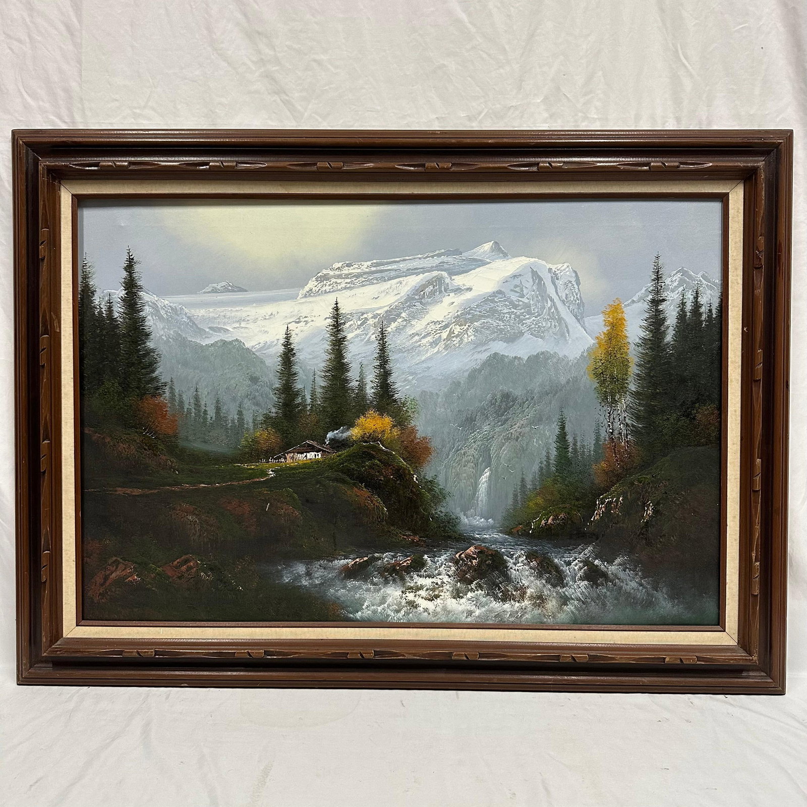 House on a Cliff by the River with Mountain Landscape Oil on Canvas Framed Unknown Artist: Oil painting on canvas, depicting a majestic mountain landscape with snow-capped peaks, a rushing river, and a cozy alpine house surrounded by autumnal trees. Unknown artist, no hallmarks or signature