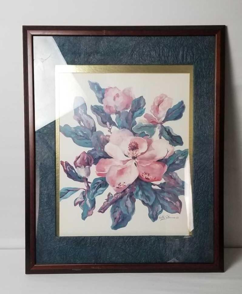 Magnolia Painting Print by Della Storms: This piece of artwork is a print with an estate signature of Della Storms. The year is unknown. The work is of a Magnolia flower. This artist does not just create art she also teaches those willing to