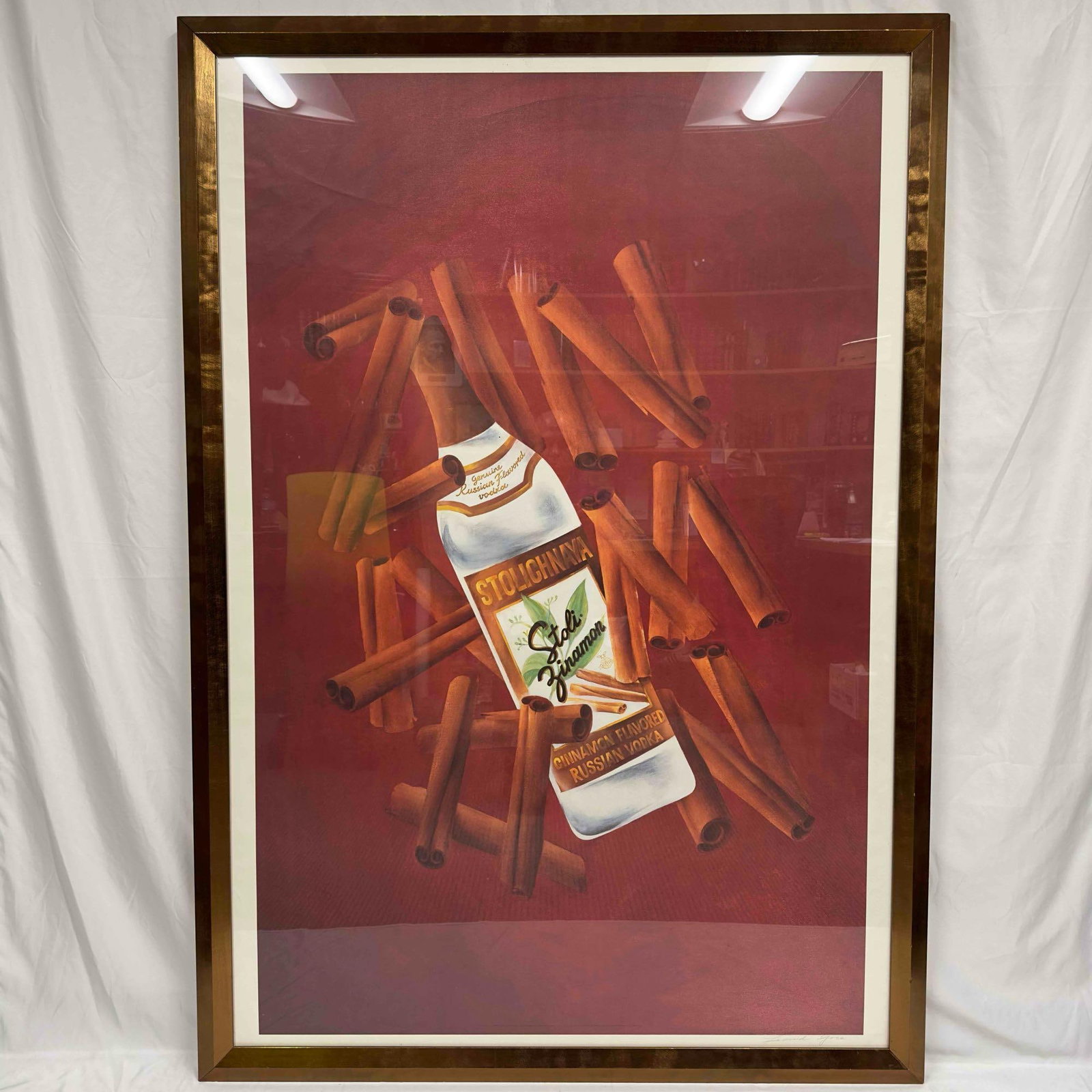 Stolichnaya Stoli Zinamon Cinnamon Russian Vodka Advertisement Large Signed Print Poster: Stolichnaya Zinamon Cinnamon Russian Vodka Advertisement Large Signed Print Poster. Artist signed by Leonid Gore on the bottom right of the print poster. The frame is a little nicked up on the corners