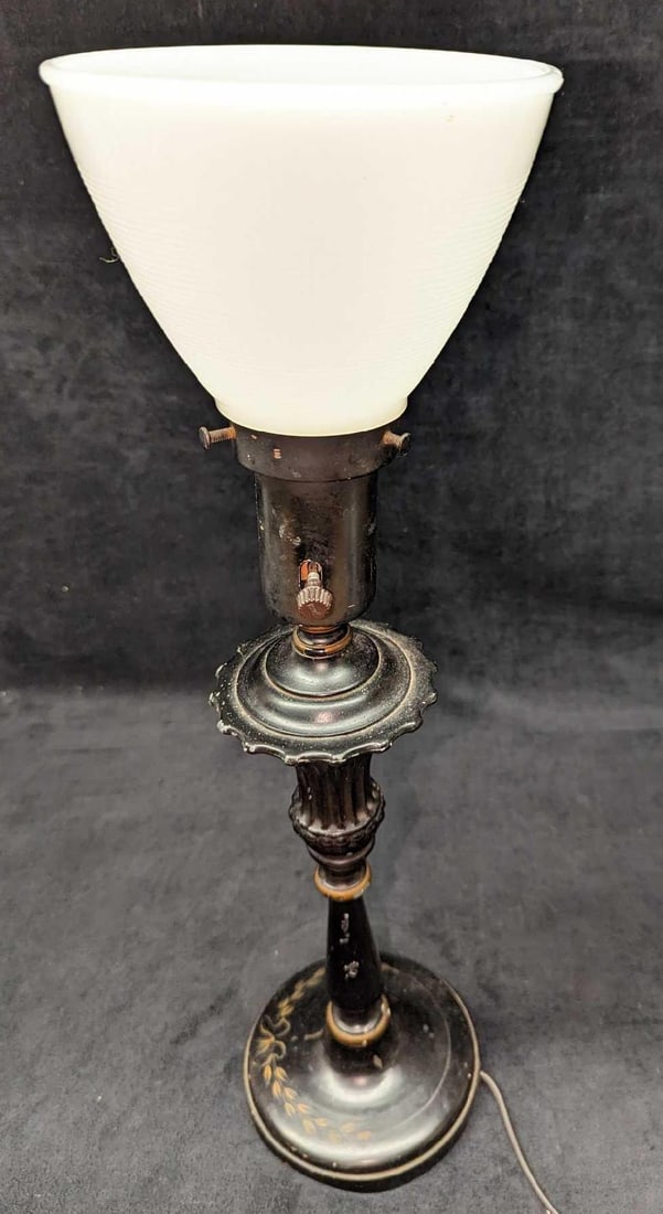 Vintage Metal Table Lamp With Floral Design: Vintage Metal Table Lamp With Floral Design. Has a hand-painted floral design on the base. This is approx 5" x 5" x 20 3/4" and it weighs 3.80 lbs. The lamp has some scratches and color loss there is 