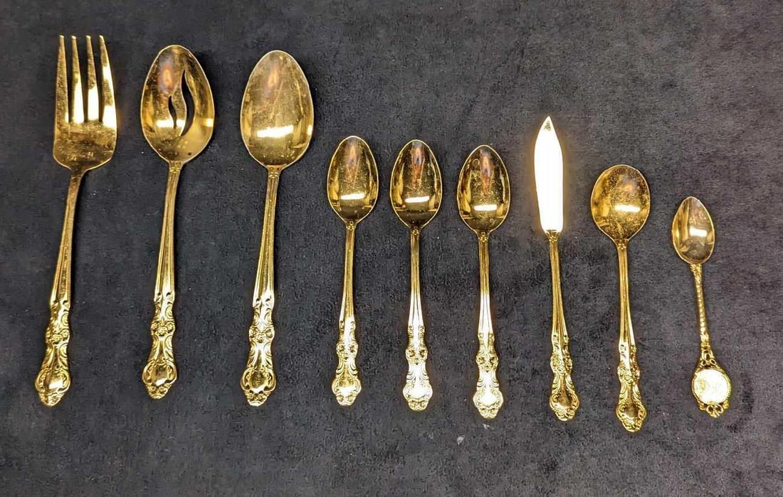 Assorted Cambridge Gold Electroplated Stainless Flatware: Assorted Cambridge Gold Electroplated Stainless Flatware. This lot includes: (3) Teaspoons. This is approx 1 1/4" x 1/4" x 6 1/8" (1) Serving Spoon. This is approx 1 3/4" x 3/8" x 
