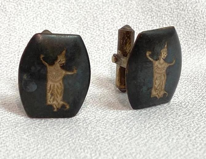 Mid-Century Sterling Thai Dancer Cufflinks: This piece of jewelry has been tested and researched prior to testing . Please view all our pictures they are part of our description. DETAILS: Metal - .925 Sterling Silver Color - Silver Stones -