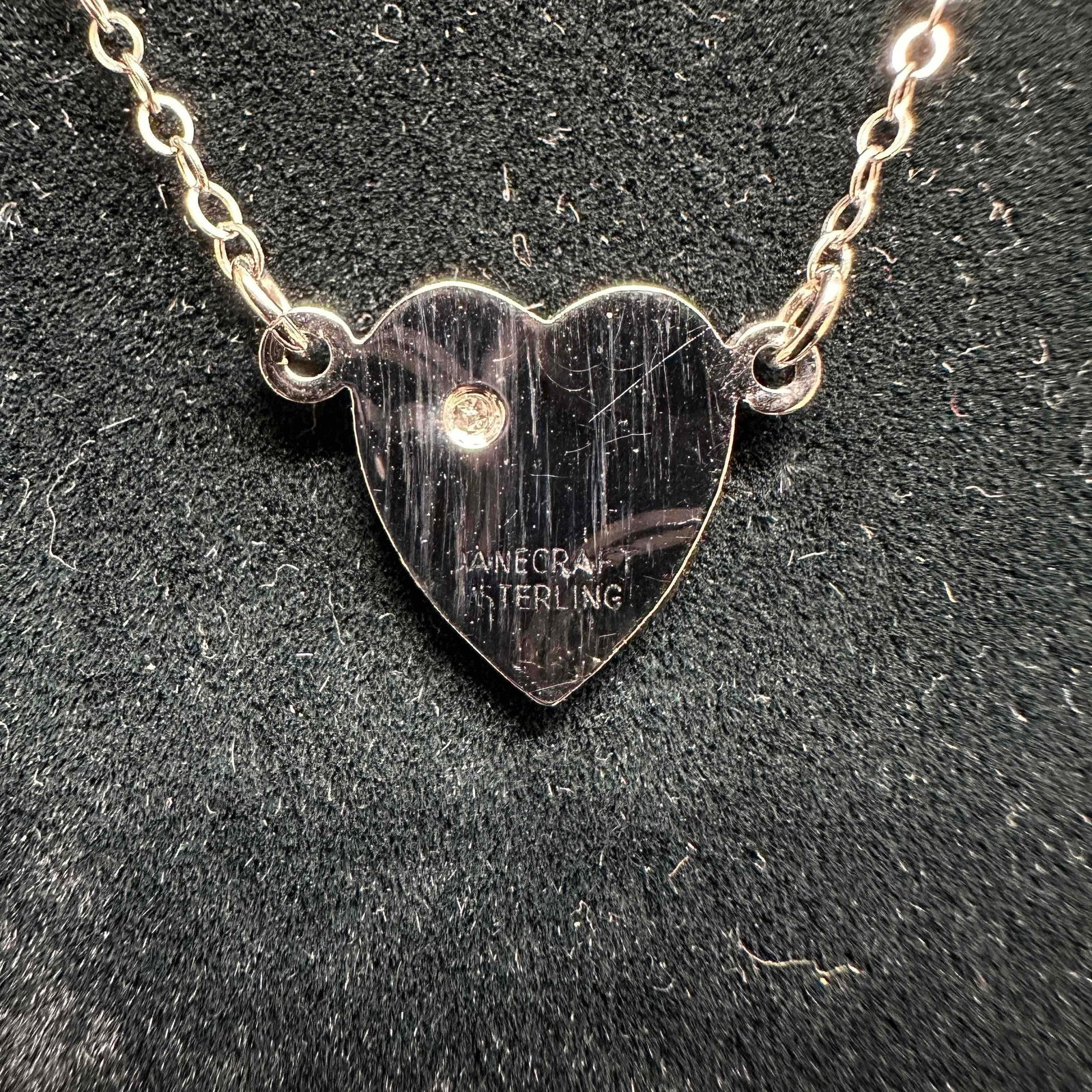 Heart Shaped Pendant Inner Light Starburst Stone Setting Sterling Silver Necklace D78: This item is in good pre-owned, previously used/displayed condition with noticeable light wear, and surface scratches. Please reference all photos for full details. This piece of jewelry has been test