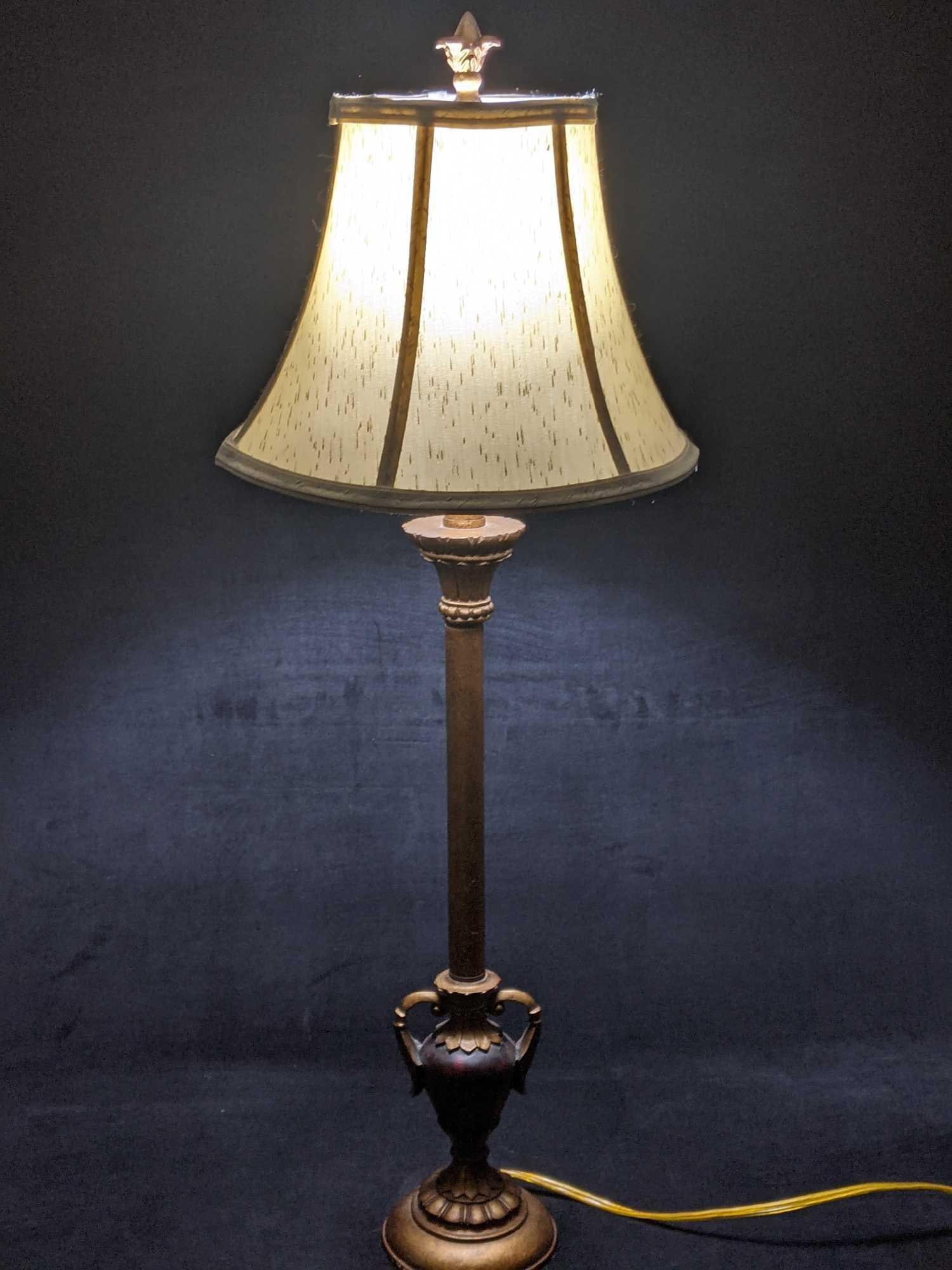 Table Lamp Brass Colored Lamp Vase Design: Table Lamp Brass Colored Lamp Vase Design This lamp is in good condition with no known damage. The lamp works great, it has a regular American plug. It comes with a lampshade, any inside light bulb wo