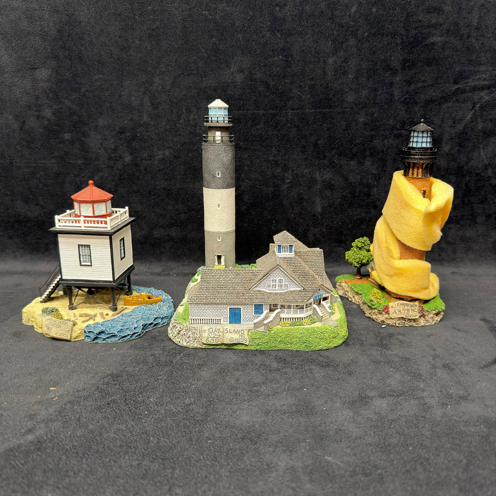 3 Harbour Lights North Carolina Lighthouse Figurines Oak Island: Lot of three Harbour Lights North Carolina lighthouse figurines, including Hatteras Beacon #537, Oak Island #240, and Currituck #436. Includes original boxes and certificates/paperwork as shown. Pre-o