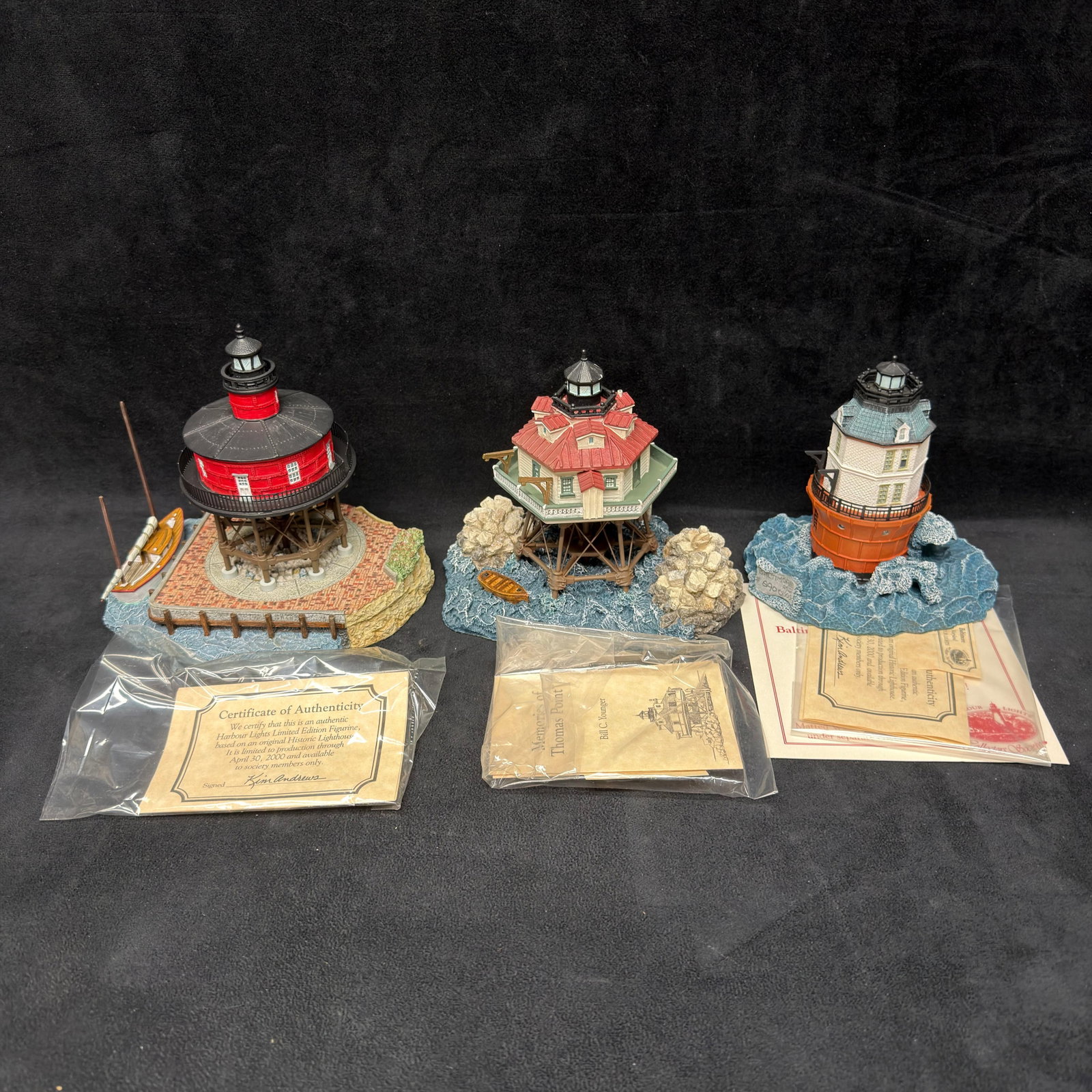 3 Harbour Lights Maryland Lighthouse Figurines Seven Foot Knoll Thomas Point Signed: Group of three Harbour Lights Maryland lighthouse collectibles, including Society Exclusive Seven Foot Knoll #521, Signature Series Thomas Point #421, and Society Exclusive Baltimore #524. Thomas Poin