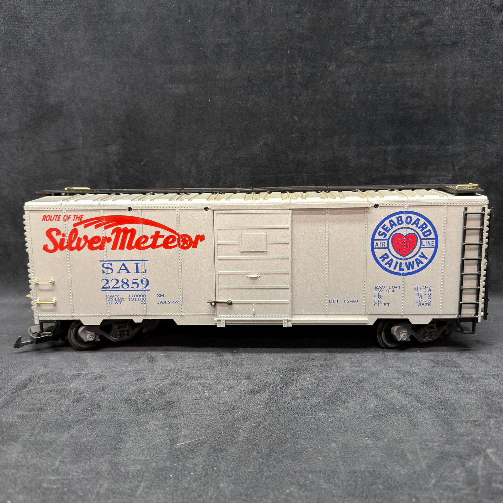 LGB Seaboard Air Line Silver Meteor G Scale Boxcar: LGB G scale Seaboard Air Line Railway boxcar, road number SAL 22859, featuring “Route of the Silver Meteor” graphics. Sliding side door, roof walk, detailed underframe, trucks, and plastic