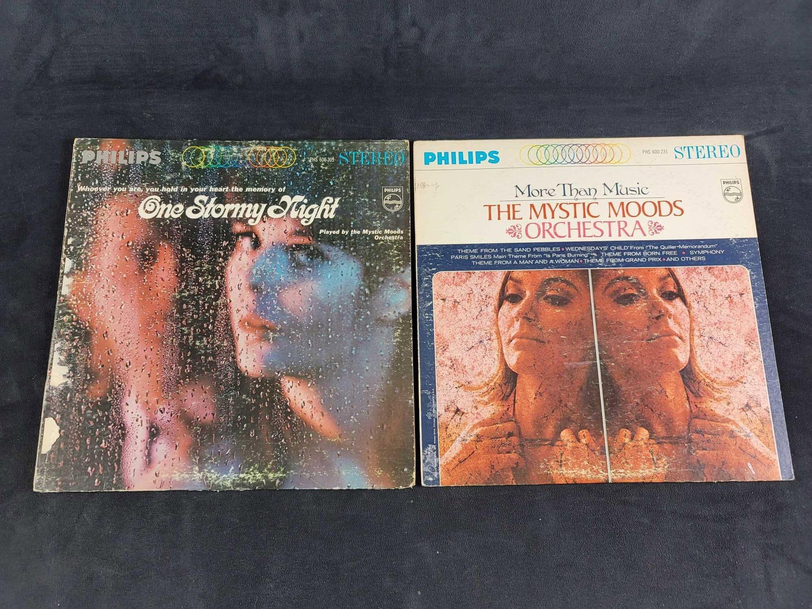 Philips Stereo Mystic Moods Vinyl Records Lot: Produced by Philips Records, 12", 33RPM, LP. One Stormy Night, played by Mystic Moods Orchestra More Than Music, played by Mystic Moods Orchestra In good condition, the sleeve of one is in f