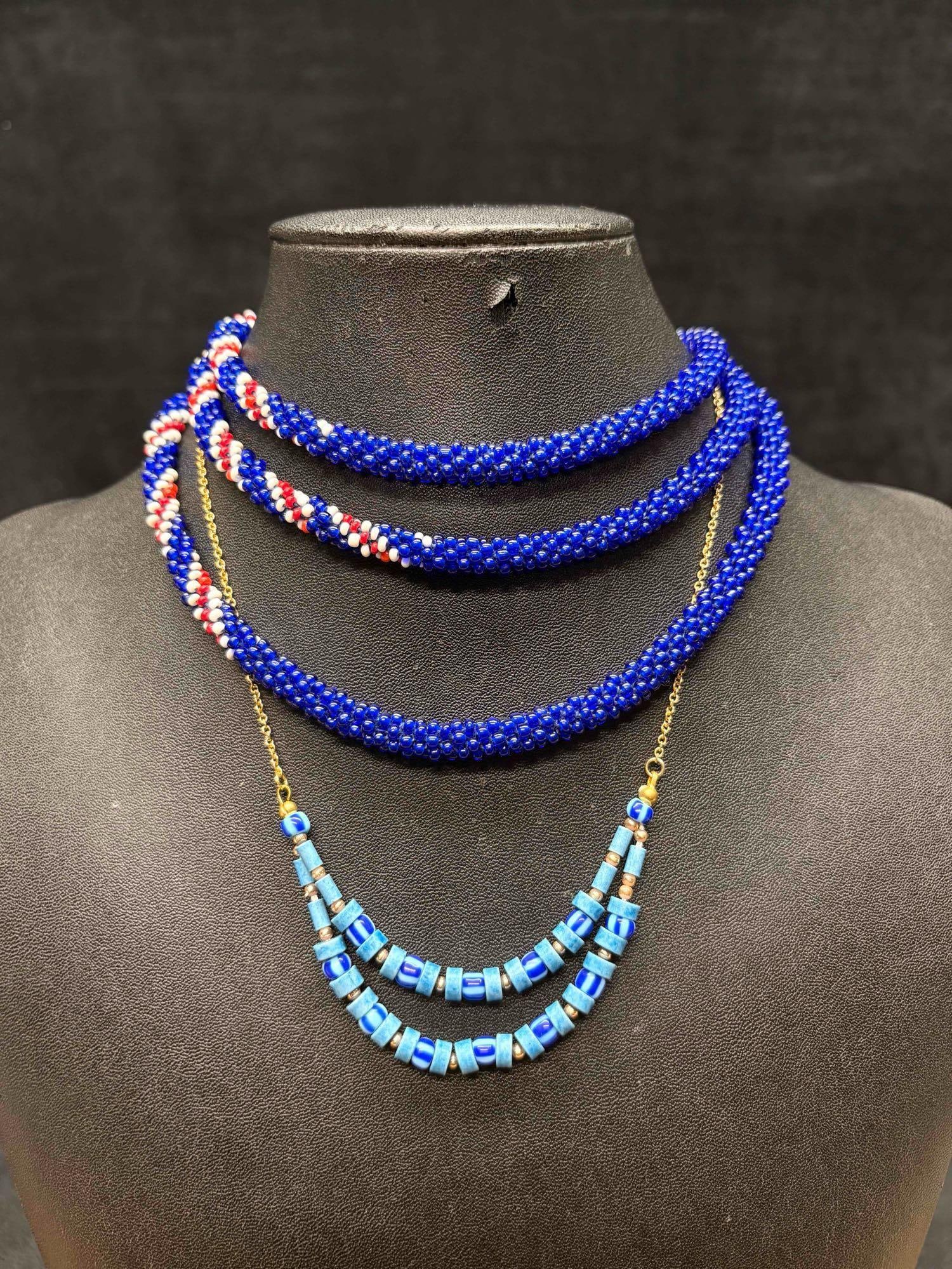 2pc Blue Crotchet Beaded Jewelry Set: This lot consists of 3 pre-owned costume jewelry necklaces with typical wear from use. Please review images for context of the lots visual conditions. APPROX WEIGHT: 1.8 OZ