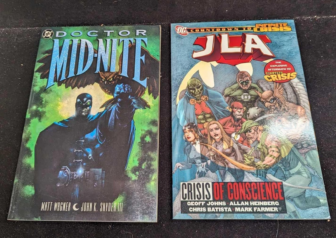 DC Comics Doctor Midnight & Justice League Comics Paperbacks: DC Comics Doctor Midnight & Justice League Comics Paperbacks. This lot includes: (1) Doctor Midnight Paperback. This was published by DC Comics and copyrighted in the year 2000. This is approx 6 3