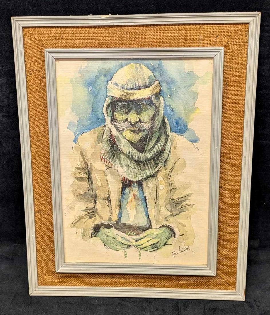 Framed Isil Ozisik Original Watercolor Man With Turban: Framed Isil Ozisik Original Watercolor Man With Turban. This is approx 14 1/2" x 1 1/4" x 18 1/4" and it weighs 3.10lbs. The frame has cracks and chips. Please see the images as they are part of the d