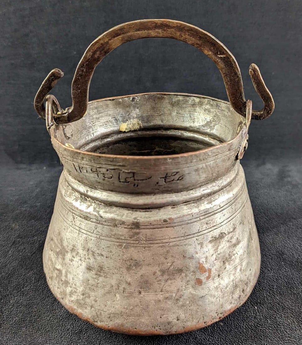 Antique Copper Pot With Handle: Antique Copper Pot With Handle. This is approx 7" x 7" x 5" and it weighs 2.08lb. The pot is in a good, vintage condition with some heavy wear, a dent on the outside and some glue residue inside the p