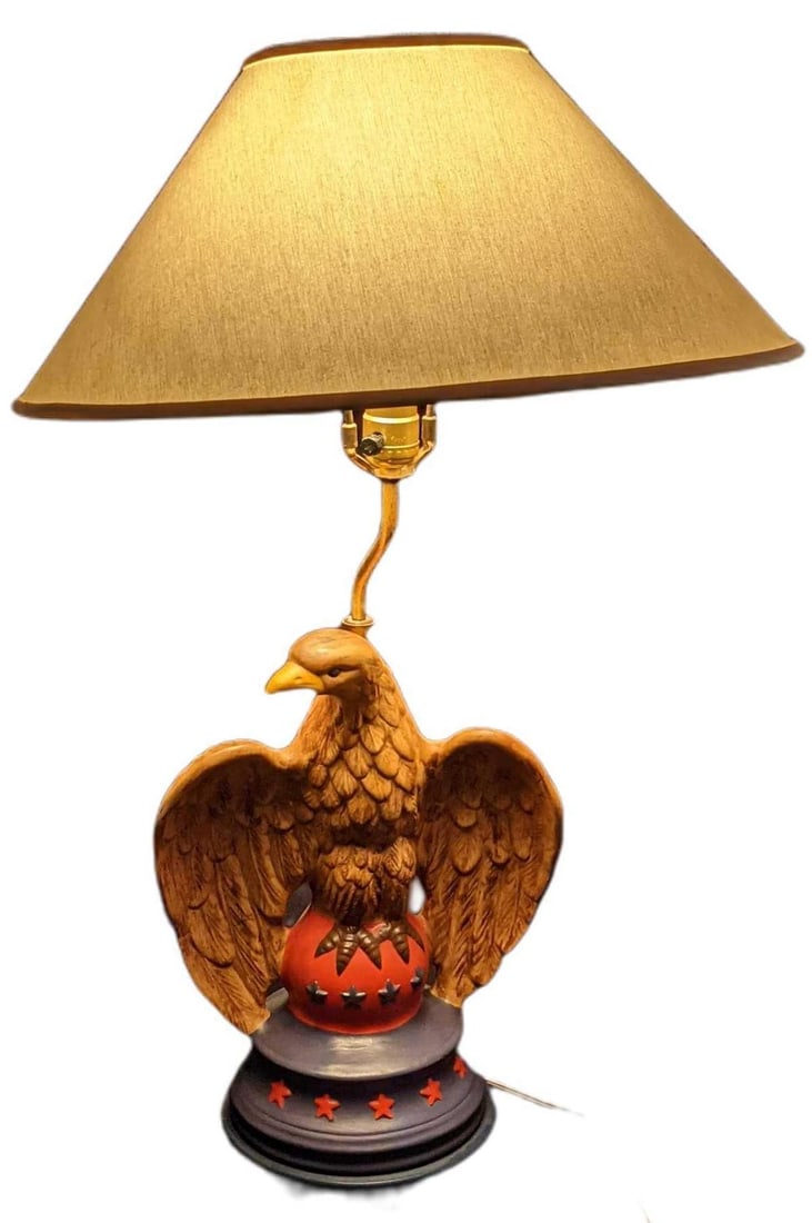 Vintage Eagle Bird Ceramic Lamp Americana: Unique ceramic hand-painted eagle lamp. The maker and date of creation is unknown. The working lamp is approx 10" x 7" x 29". The shade is approx 18" x 18" x 7 1/2". Together they weigh approx