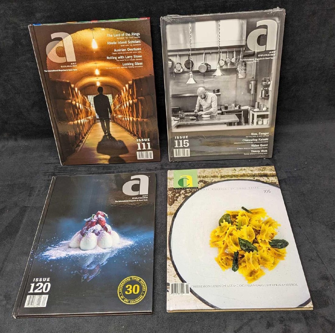 Art Culinaire Hardcover Magazines 105 111 115 120: Art Culinaire Hardcover Magazines 105 111 115 120 . This lot includes four sealed hardcover magazines. Each is approx 9 3/4" x 1/4" x 12 7/8" and the total weight is 7.90lbs. There is some wear on