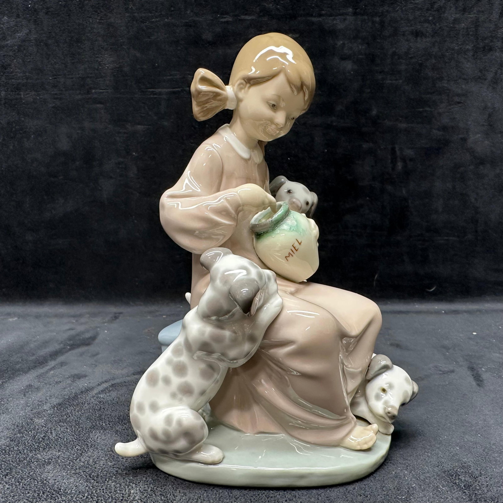 Lladro Honey Lickers The Sweet Mouthed Porcelain Figurine Dalmatian Dogs: Hallmark of the bottom of the figure, handmade in Spain. No chips, breaks, or noticeable imperfections were noticed. Light markings under the bottom of the figure. This item is in pre-owned,