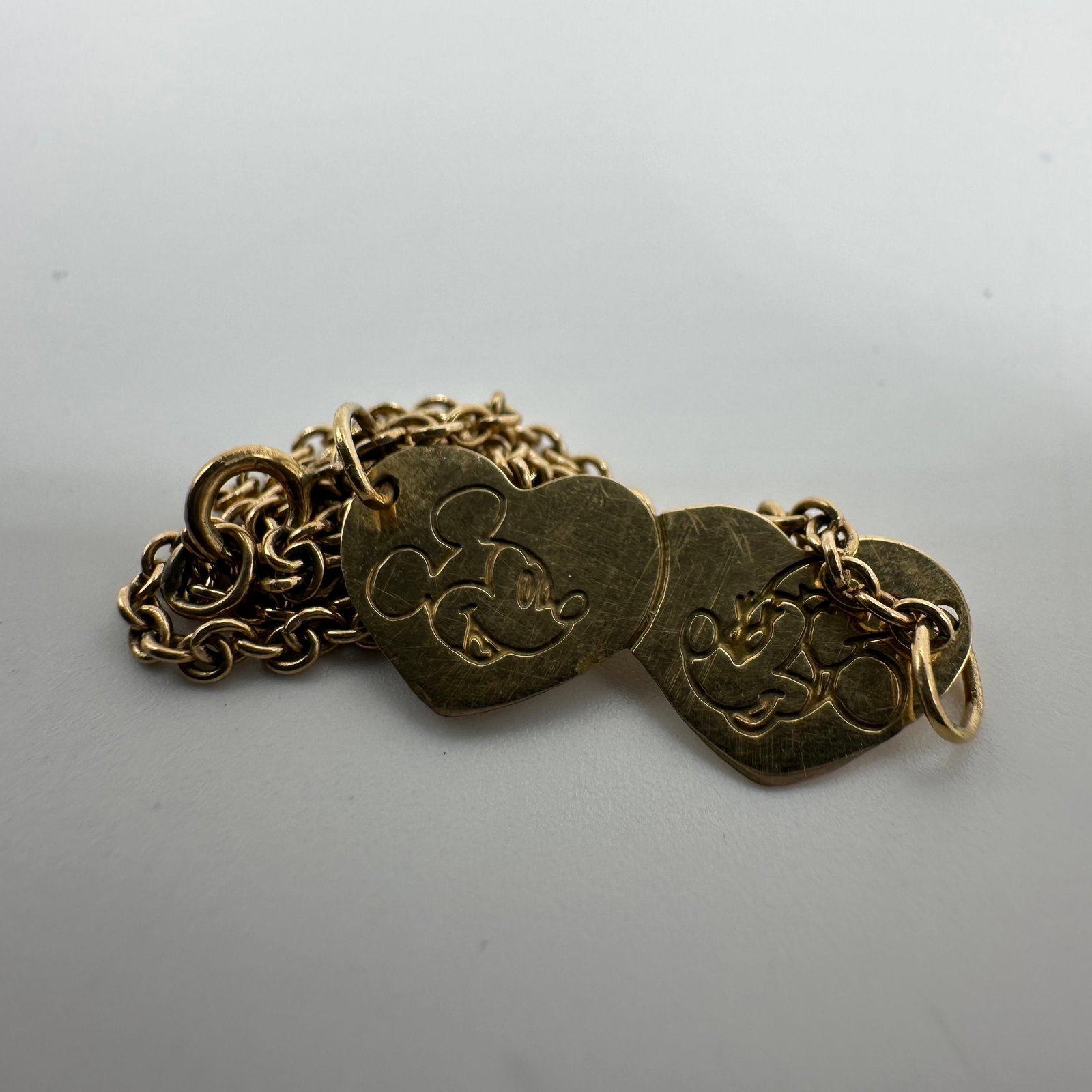 Double Heart Mickey and Minnie Mouse 14K Gold Bracelet Disney: This item is in good pre-owned, previously used/displayed condition with noticeable light wear and surface scratches. Please reference all photos for full details. This piece of jewelry has been teste