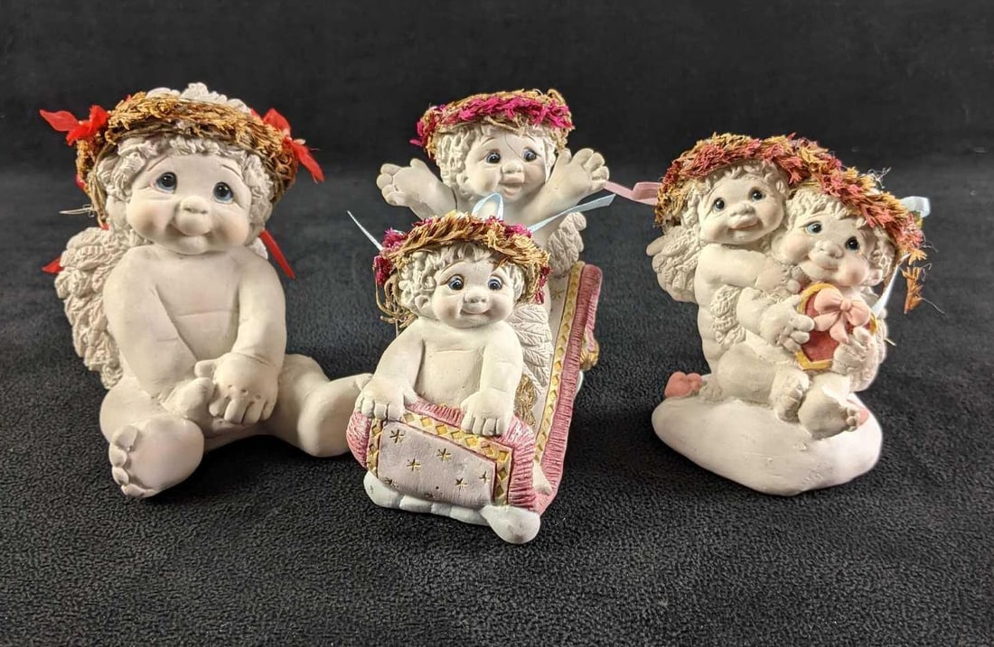 Three Dreamciles Baby Figurines (1) "Christmas Cutie" (2) "Share the Magic" (3) " All My Lovin": Three Dreamciles Baby Figurines (1) "Christmas Cutie" (2) "Share the Magic" (3) " All My Lovin" (1) "Christmas Cutie" Baby angle with poinsettia flower crown,