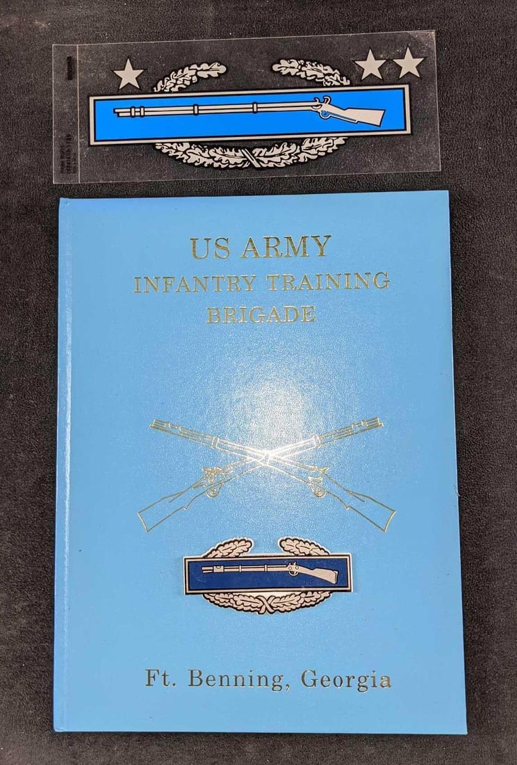 Infantry Training Brigade Hardcover & Combat Infantryman Sticker & Magnet: This lot includes: (1) US Army Infantry Training Brigade Hardcover Book. Ft Benning, Georgia. Is approx 9" x 3/8" x 12". The book is in a good, used condition with some spine damage inside