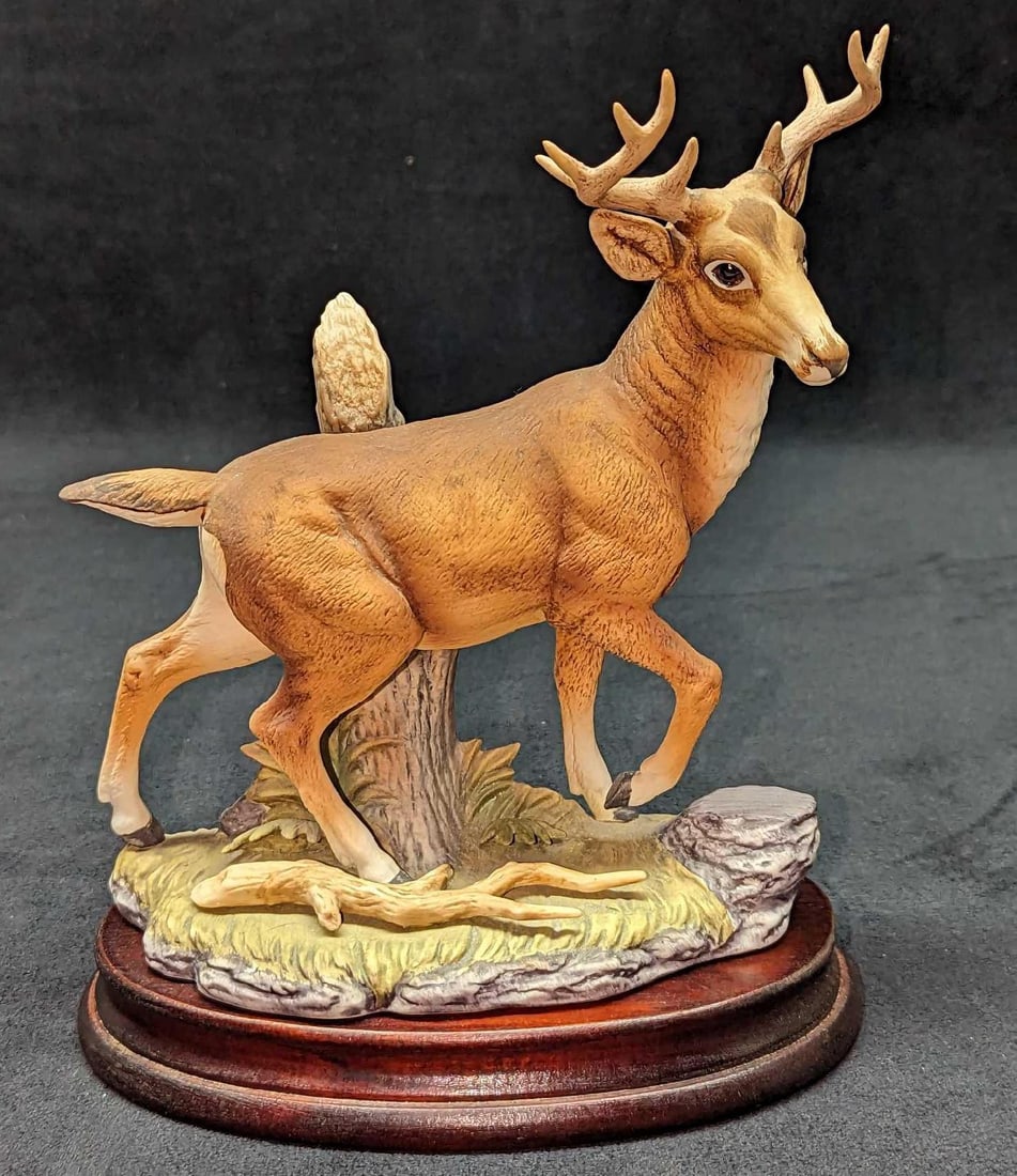 Retired Andrea By Sadek Stag Porcelain Figurine: Retired Andrea By Sadek Stag Porcelain Figurine. The figurine is approx 7" x 3" x 7 1/2". The display stand is approx 7 1/2" x 4 1/4" x 1". The total weight is 1.34lb. The figurine has no chips or