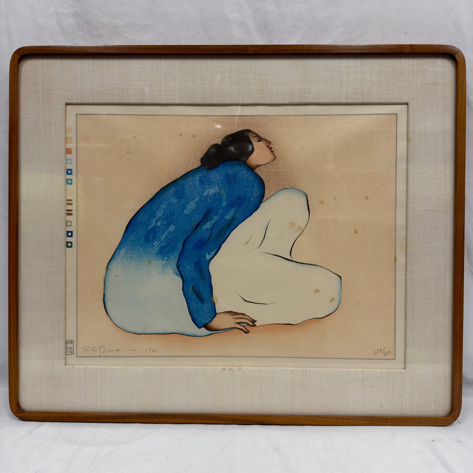 R.C. Gorman Signed and Numbered Color Woodblock Print Seated Woman Blue Sora: Framed limited edition woodblock print by celebrated Native American artist R.C. Gorman (1931–2005), depicting a seated female figure in Gorman's recognizable minimalist style. Pencil signed