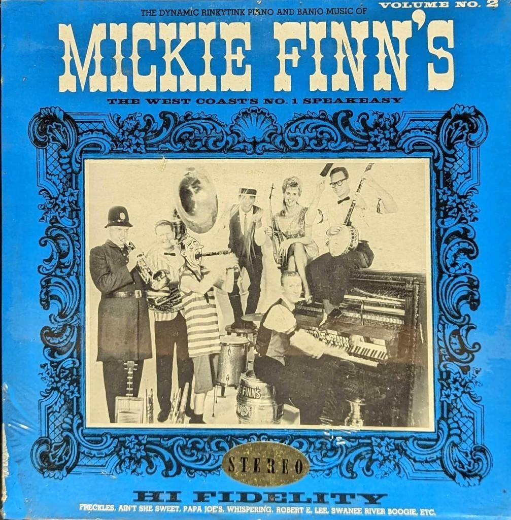 Vintage Sealed Mickie Finn's Volume 2 LP: Vintage Sealed Mickie Finn's Volume 2 LP. This was released by Capitol Records in the 1960s. The LP is approx 12 1/4" x 12 1/4" and it weighs 0.58lb. There is some wear/rips on the plastic wrap along 