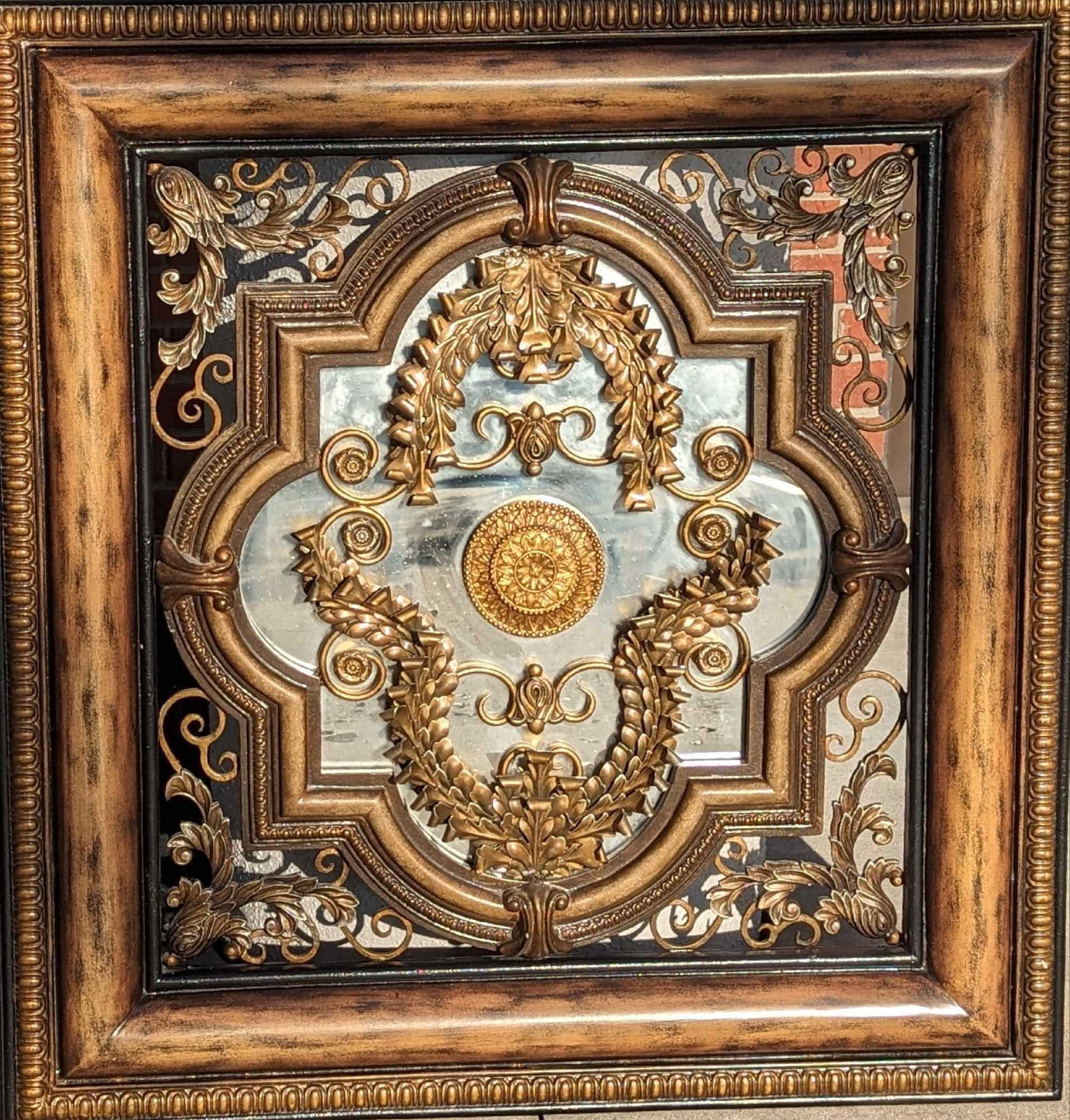 Vintage Style Lam Lee Group Baroque Style Mirror: Vintage Style Lam Lee Group Baroque Style Mirror. This is approx 33 1/2" x 2 3/4" x 35 1/2" and it weighs 46lbs. The mirror has some markings and chips. This is made of light metal and sculpted