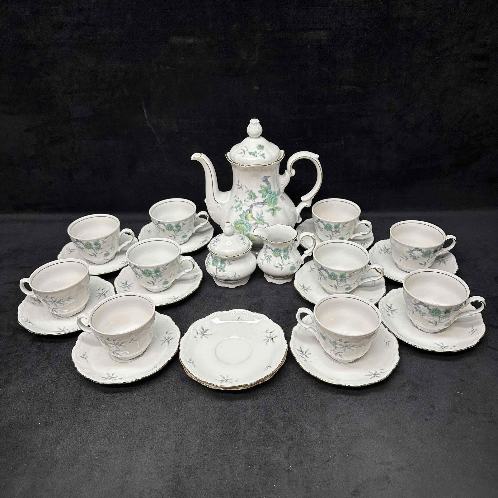 Green Ming Mitterteich Bavaria Germany Tea Set Pot Creamer and Sugar: Light wear noticed along the bottom of each piece, no chips, cracks, or breaks in the porcelain. These items are in good pre-owned, previously displayed condition with light wear and surface