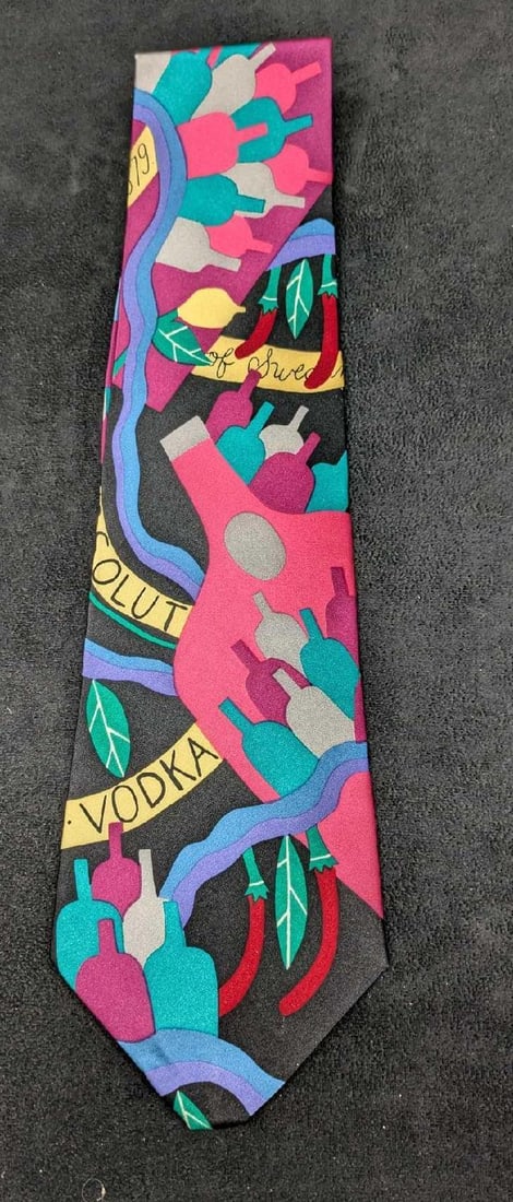 Absoulut Vodka Marcia G. Yerman Silk Tie New: Absoulut Vodka Marcia G. Yerman Silk Tie New. 100% silk tie designed by artist Marcia G. Yerman Silk Tie New. This silk tie is still in the original packaging and has never been used or worn. The