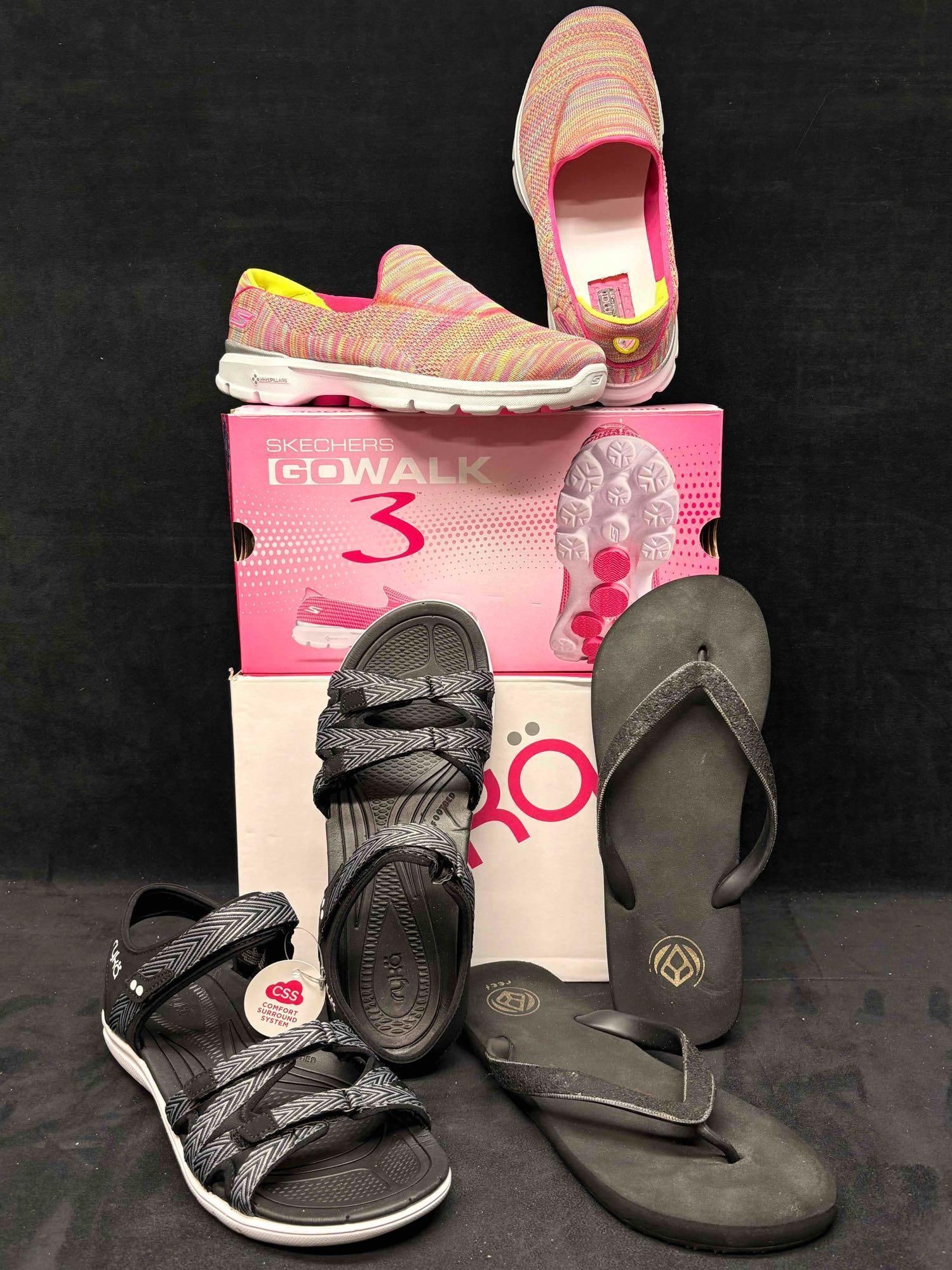 Sketchers GO Walk Sneakers with Ryka and Reef Black Sandals Bundle: Sitting in brand-new to like-new conditions, this bundle consists of orthopedic, comfort-focused Women's shoes. The Sketchers and Ryka come in their original boxes, both of which are in good shape