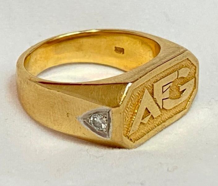 14k Gold Award Ring AFG 2 Diamonds: This piece of jewelry as been tested and researched prior to testing . Please view all our pictures they are part of our description. DETAILS: Metal - 14 karat gold Color - Yellow Gold Stones - Diamon