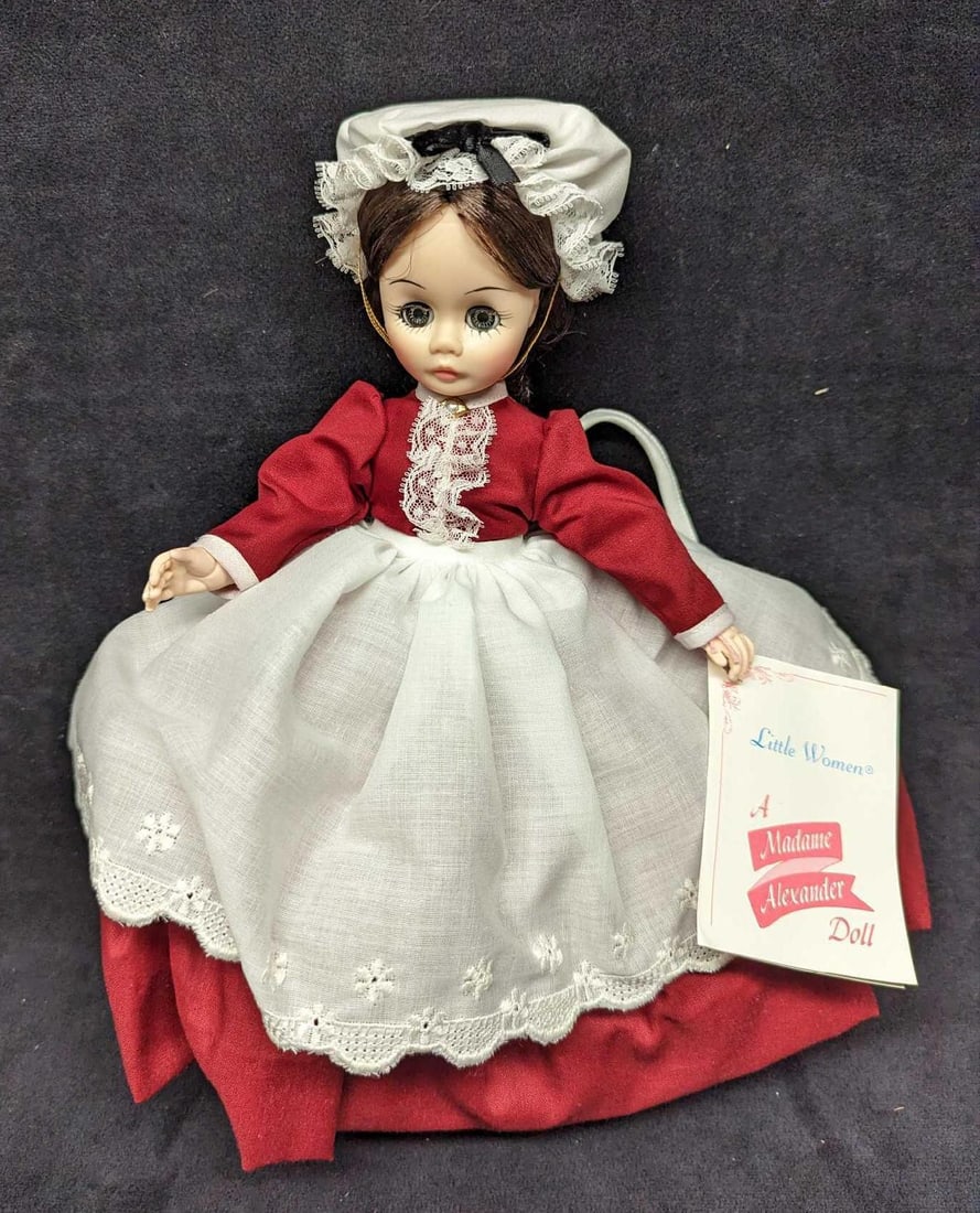 12" Madame Alexander Marme Little Women Doll: 12" Madame Alexander Marme Little Women Doll. It comes in its original box which is approx 10" x 12" x 3 1/2" and it weighs 1lb. The doll is approx 9" x 7" x 12". The box has some shelf-wear and the