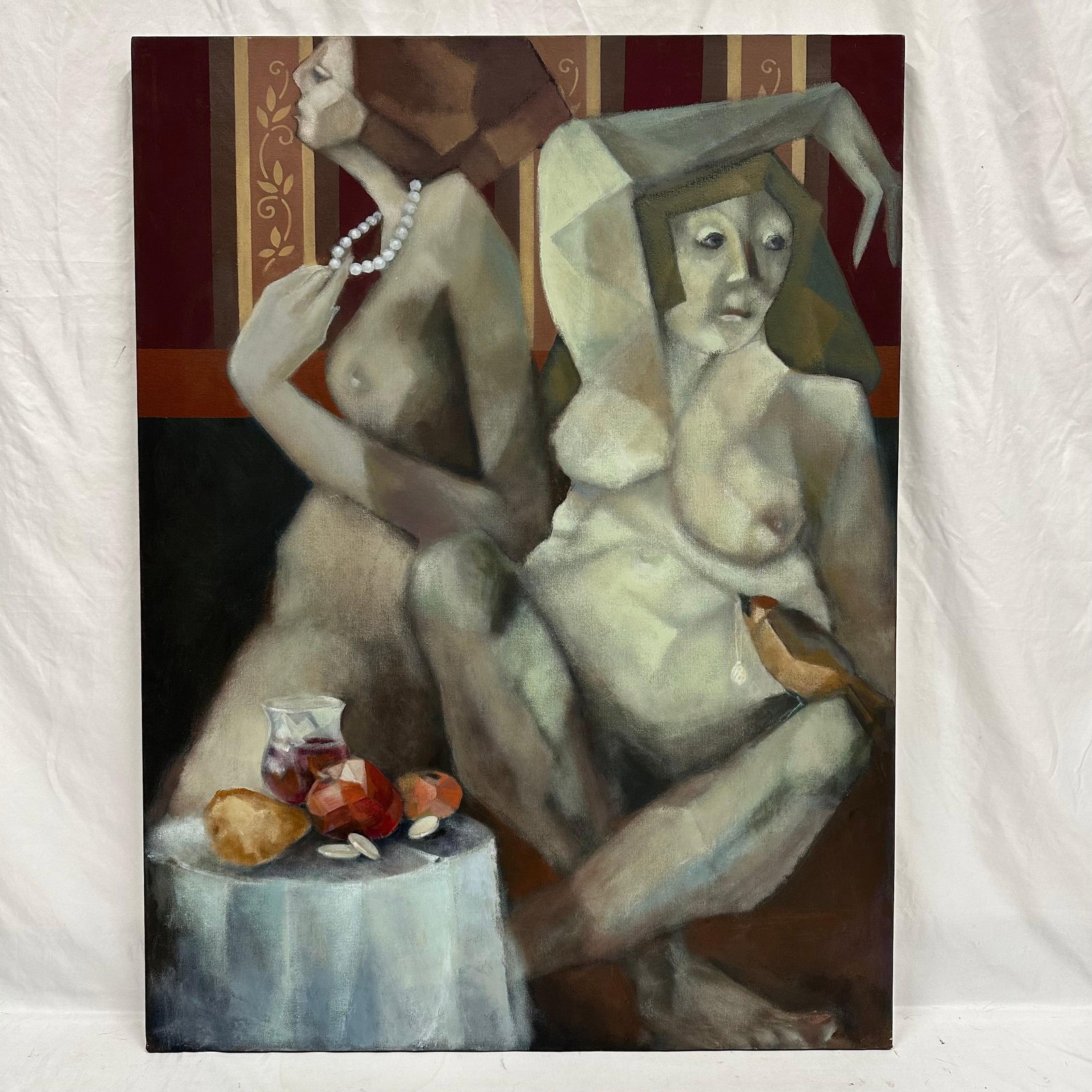 Modern Figurative Oil Painting of Two Seated Nude Figures on Canvas Unsigned: Original modern figurative painting depicting two stylized nude female figures seated in an interior scene with a small table holding fruit, glassware, and objects. Rendered in muted earth tones with