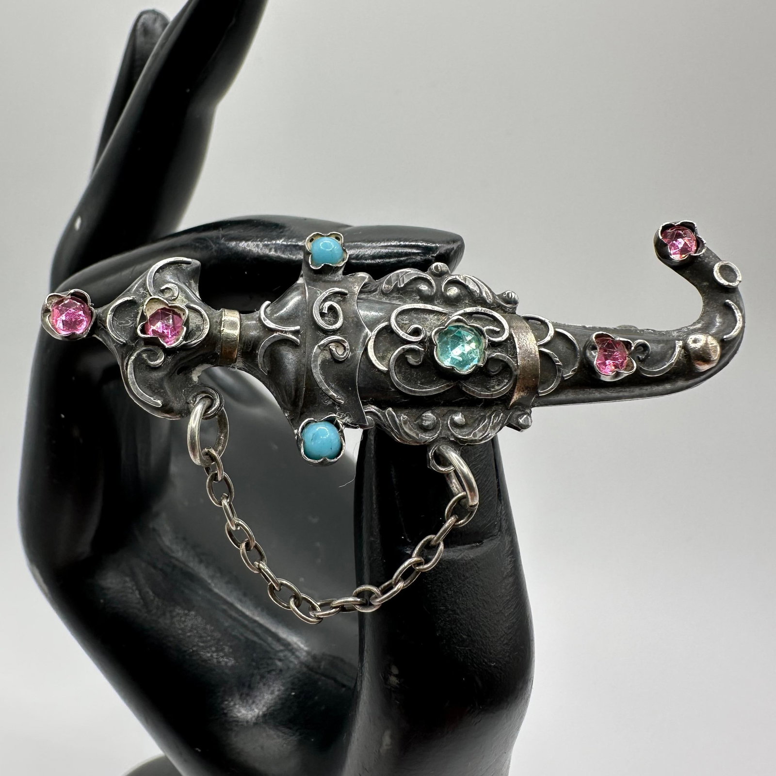 Silver Dagger Sword Brooch Pin Faux Stone Rhinestone Accents: This item is in good pre-owned, previously used/displayed condition with noticeable light wear and surface scratches. Please reference all photos for full details. This piece of jewelry has been
