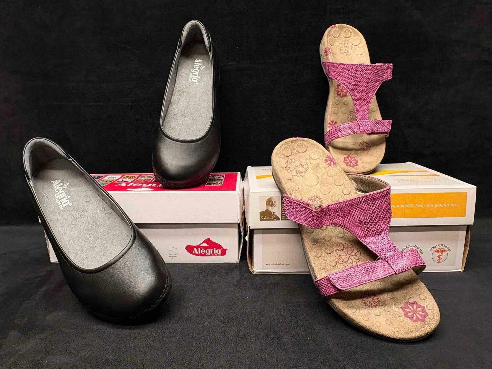 Orthaheel Samoa Slide Sandals and Alegria Black Ballet Flats Bundle: Sitting in brand-new to like-new conditions, this bundle consists of orthopedic, comfort-focused Women's shoes. Still in their original boxes, both shoes are in good shape with no