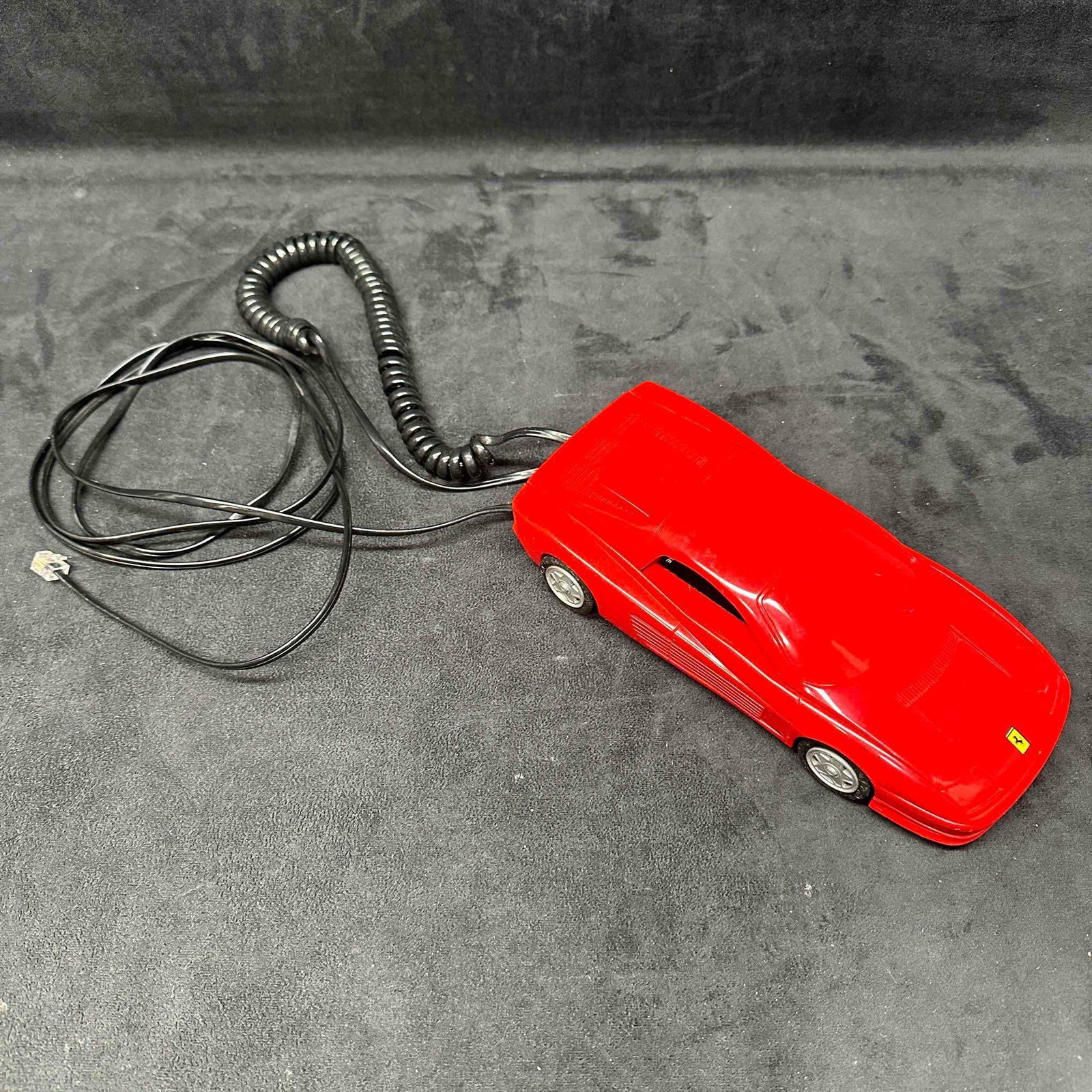 Vintage Dialfone 80's Red Ferrari Testarossa Landline Phone Sports Car Wired Telephone: Vintage sports car wired telephone featuring a red Ferrari Testarossa. A few minor black marks and scratches on the phone, overall good condition with original wiring. This item is in good pre-owned,