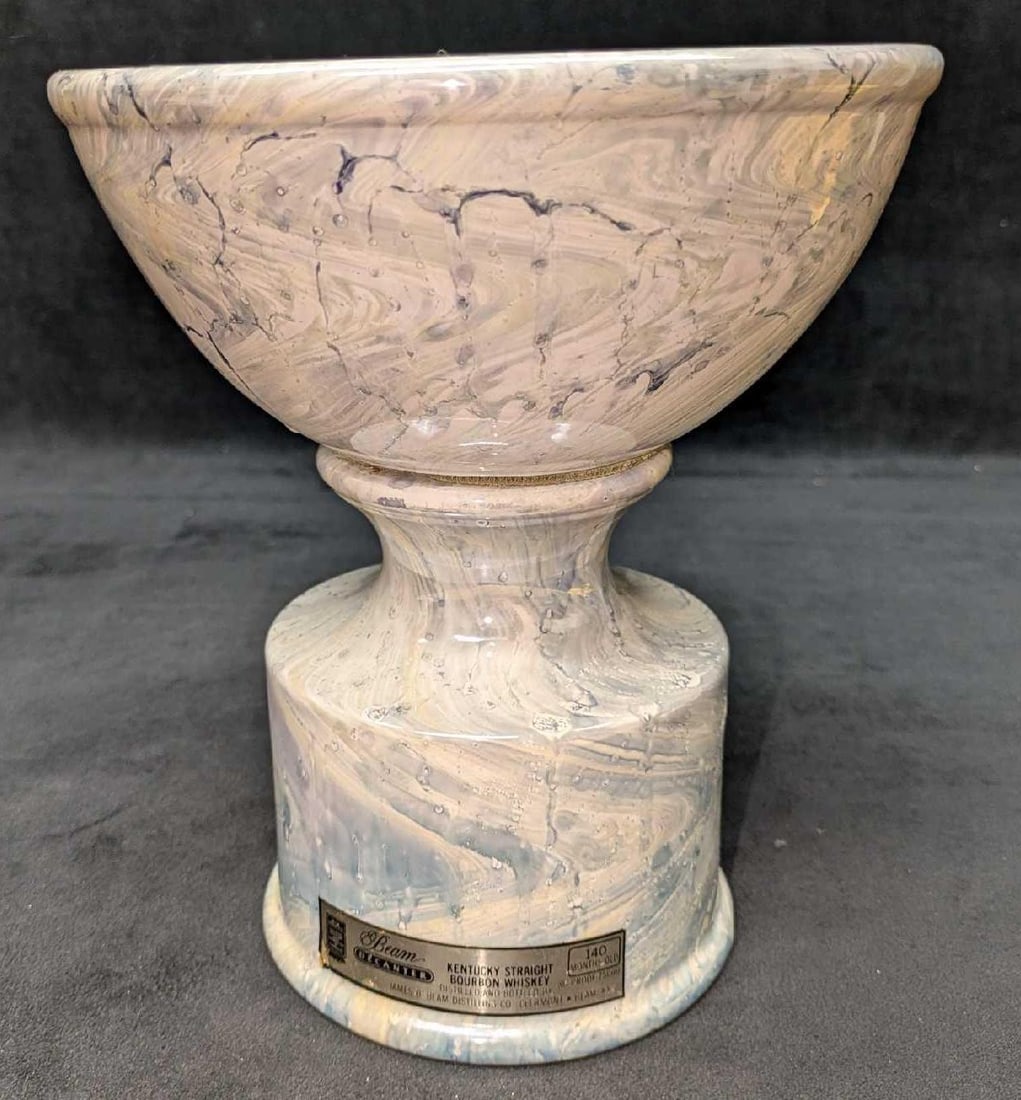 Vintage Jim Beam Bourbon Whiskey Decanter Marble Bowl A: Vintage Jim Beam Bourbon Whiskey Decanter Marble Bowl A. This was released in the year 1986 and made of Regal China. The decanter is approx 5 1/4" x 5 1/4" x 6 1/2". The top is 8" x 8' x 3 1/2" and