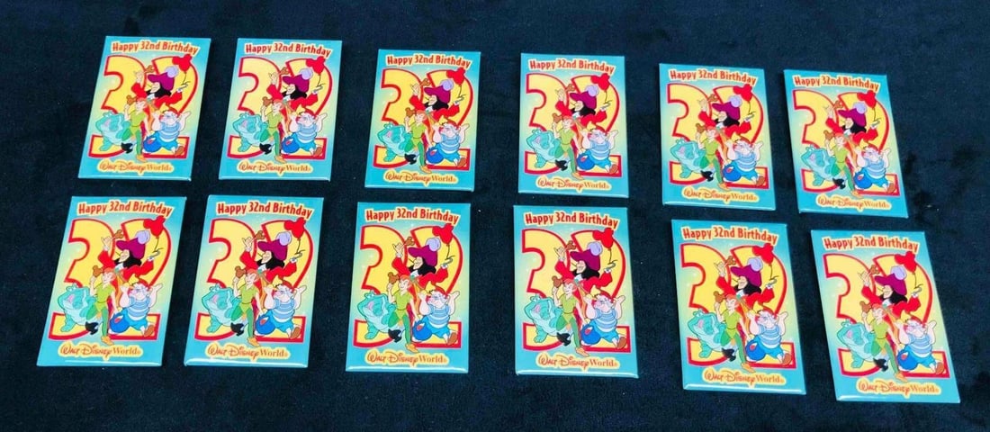 12 "Happy 32nd Birthday" Walt Disney World Peter Pan Pins: This lot contains 12 "Happy 32nd Birthday" Walt Disney World Peter Pan Pins. Each button is approx 3 1/4" x 2 1/4" and altogether they weigh about 0.3lbs. Overall the Buttons are in good used conditio