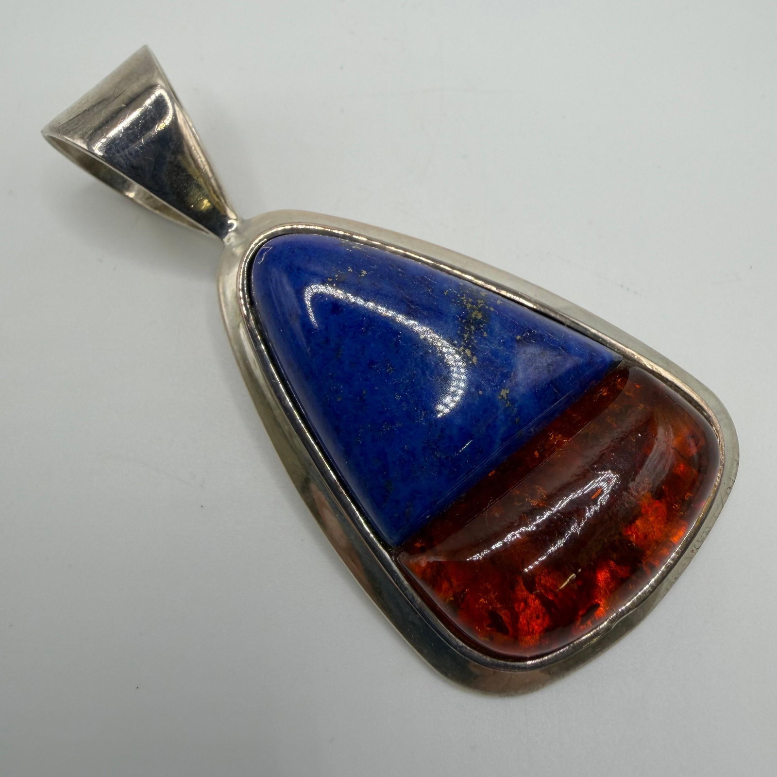 DTR Desert Rose Trading Lapis and Amber Resin Sterling Silver Pendant AB40: This item is in pre-owned, previously used/displayed condition with noticeable light wear and surface scratches. Please reference all photos for full details. This piece of jewelry has been tested and