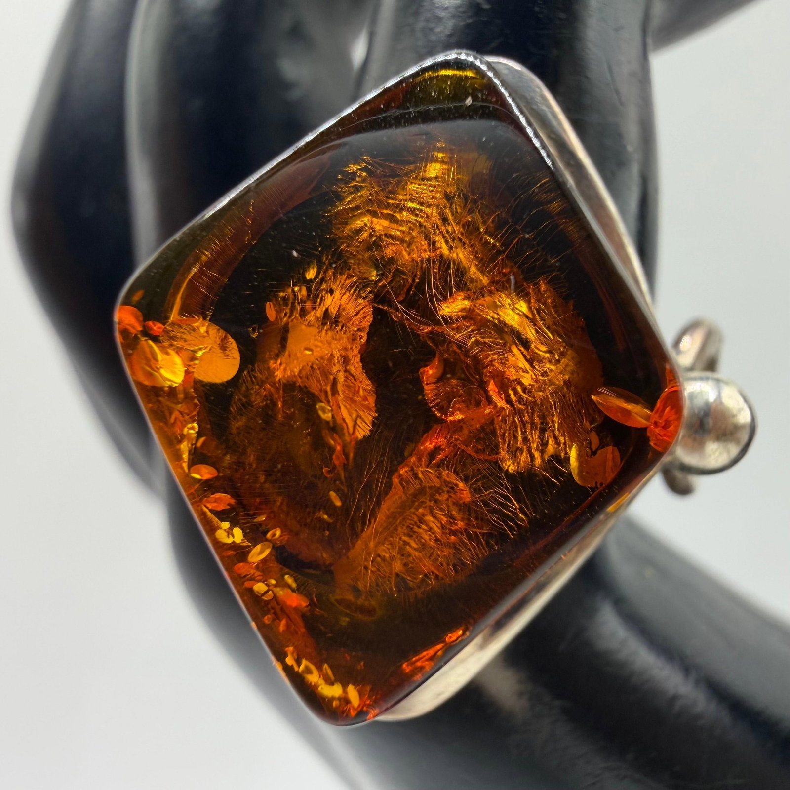 Valerio Baltic Amber Rectangular Cabochon Sterling Silver Ring V8 Poland AB47: This item is in pre-owned, previously used/displayed condition with noticeable light wear and surface scratches. Please reference all photos for full details. This piece of jewelry has been tested and