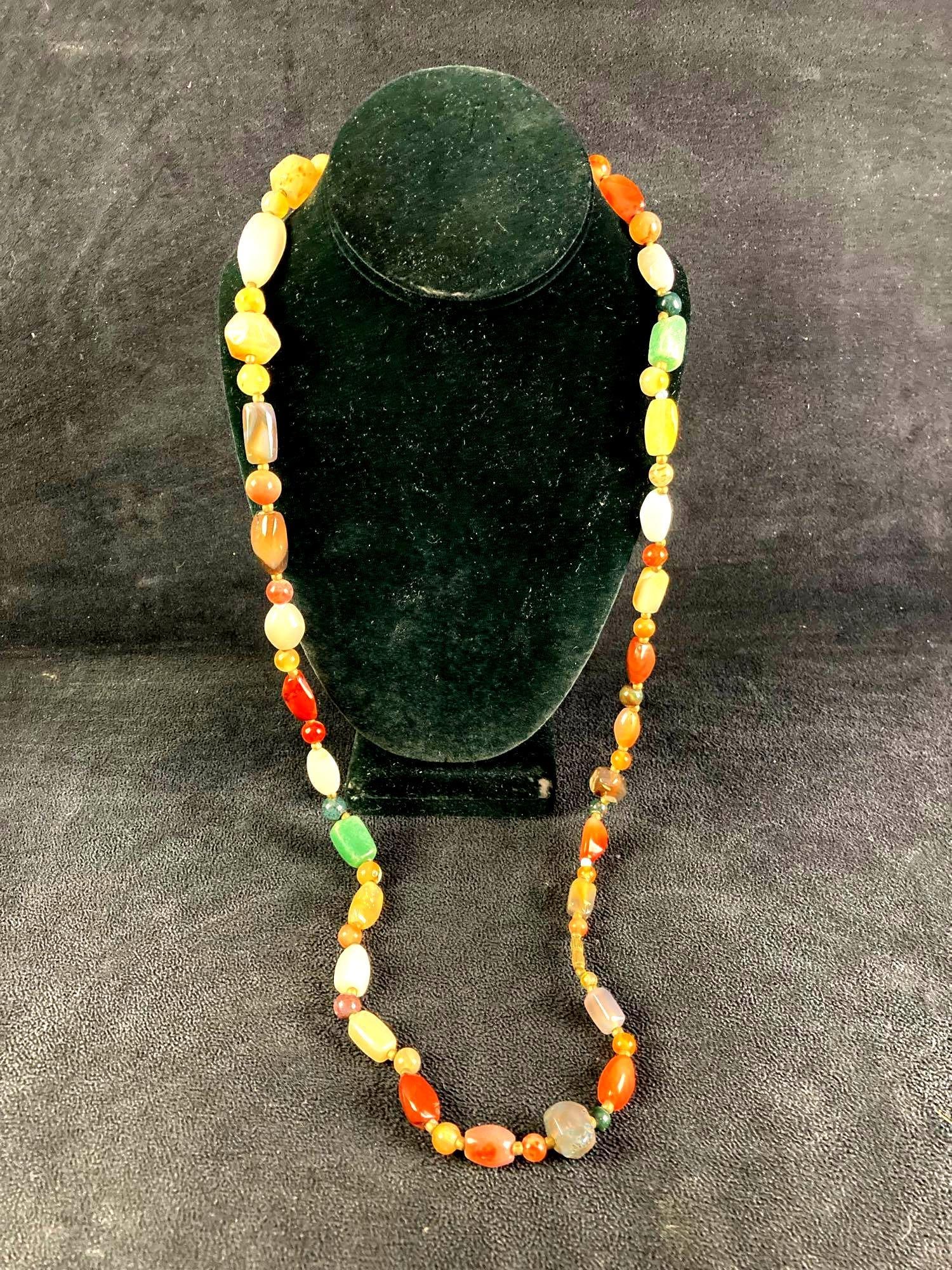 Gem Stone Costume Jewelry: Up for auction is a recent estate find, gem stone costume jewelry with an assortment of gems stones. All of the gemstones appear to be polished and range from green aventurine to calcite. Overall ,a