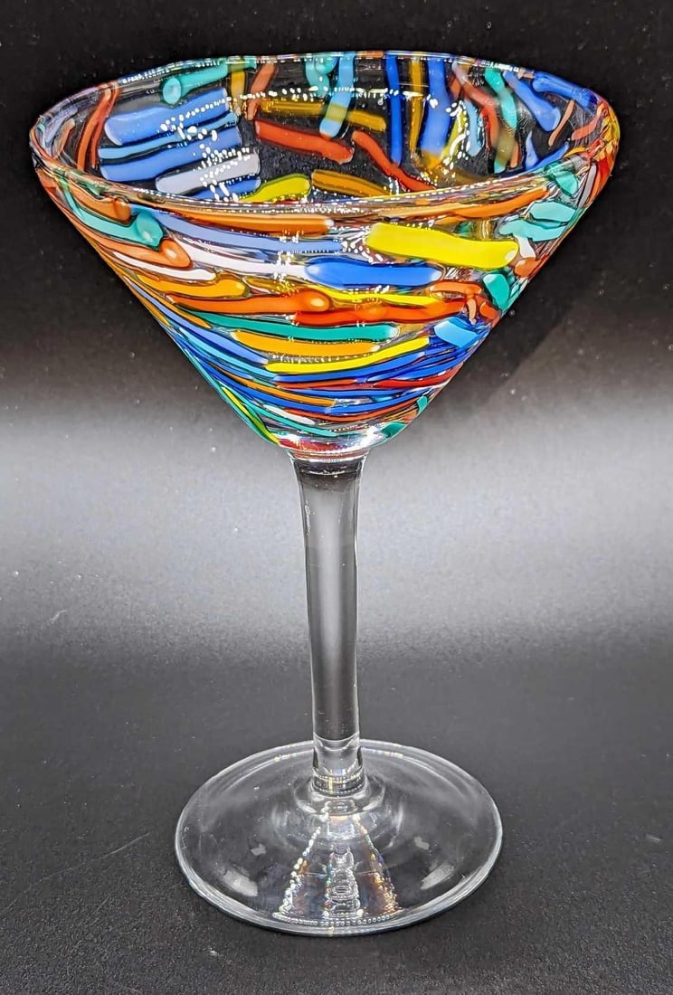 Glass Confetti Martini Glass D: Glass Confetti Martini Glass D. This is approx 4 3/4" x 4 3/4" x 7 1/8" and it weighs 0.68lb. There are no chips or cracks.