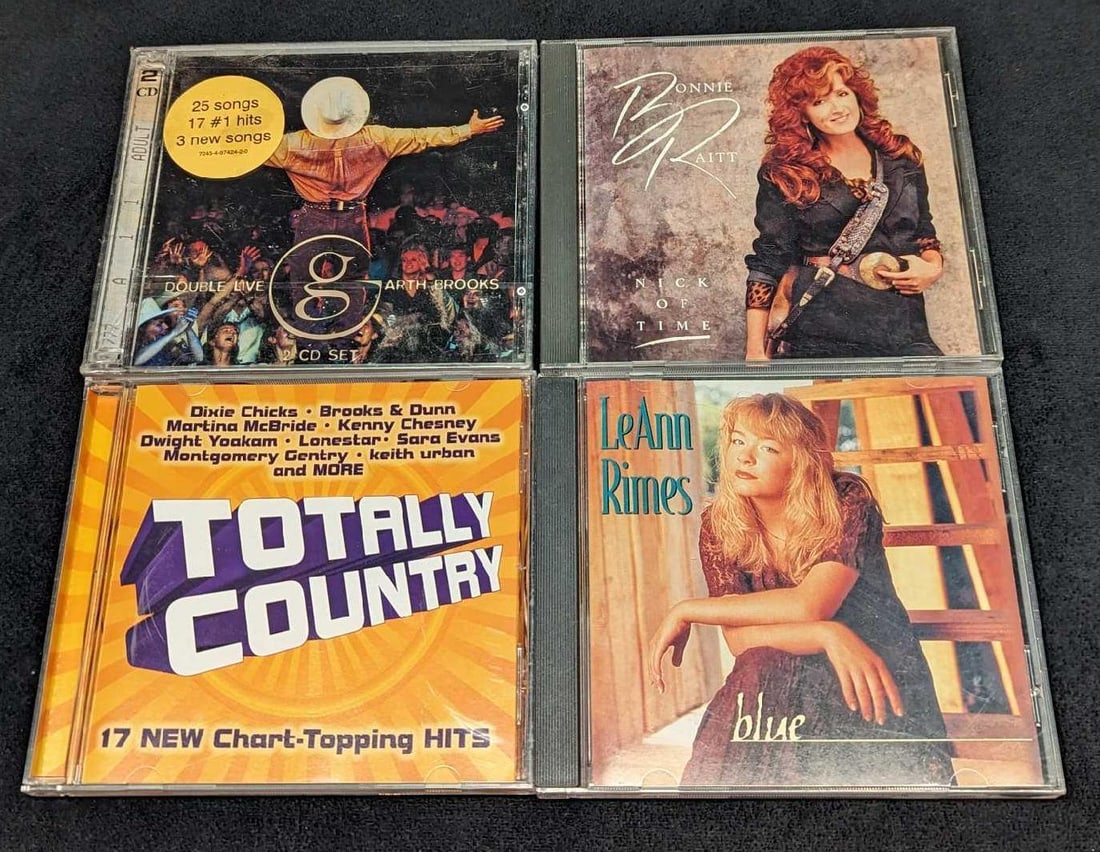 4 Compact Discs Garth Brooks LeAnn Rimes Bonnie Raitt: 4 Compact Discs Garth Brooks LeAnn Rimes Bonnie Raitt . This lot includes: (1) Bonnie Raitt - Nick Of Time. This was released by Capitol Records in 1989. (1) Totally County - 17 New