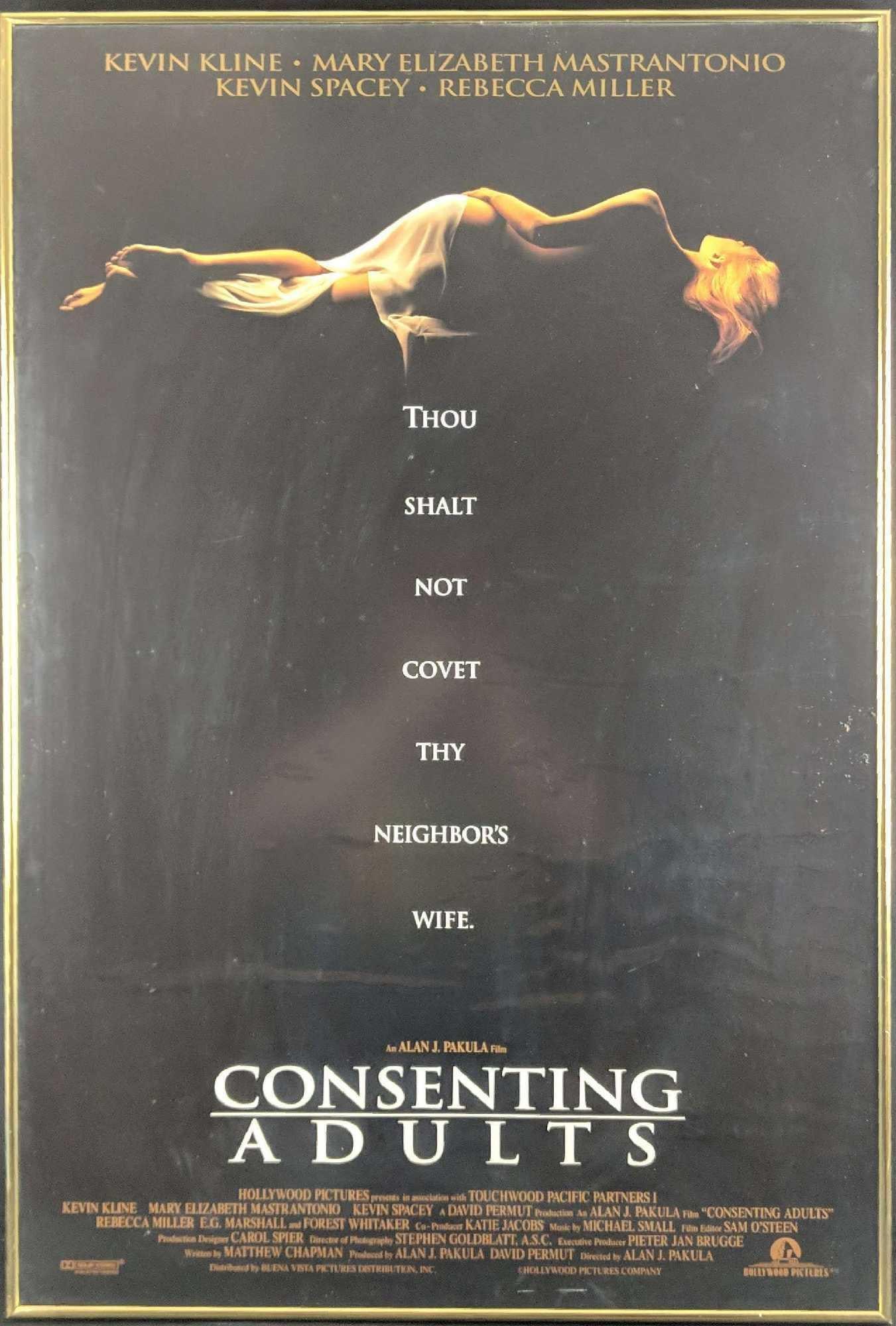 Framed Consenting Adults 1992 Movie Poster: Consenting Adults is a 1992 American mystery crime-thriller film directed by Alan J. Pakula, and stars Kevin Kline, Mary Elizabeth Mastrantonio, Kevin Spacey, and Rebecca Miller. The original music