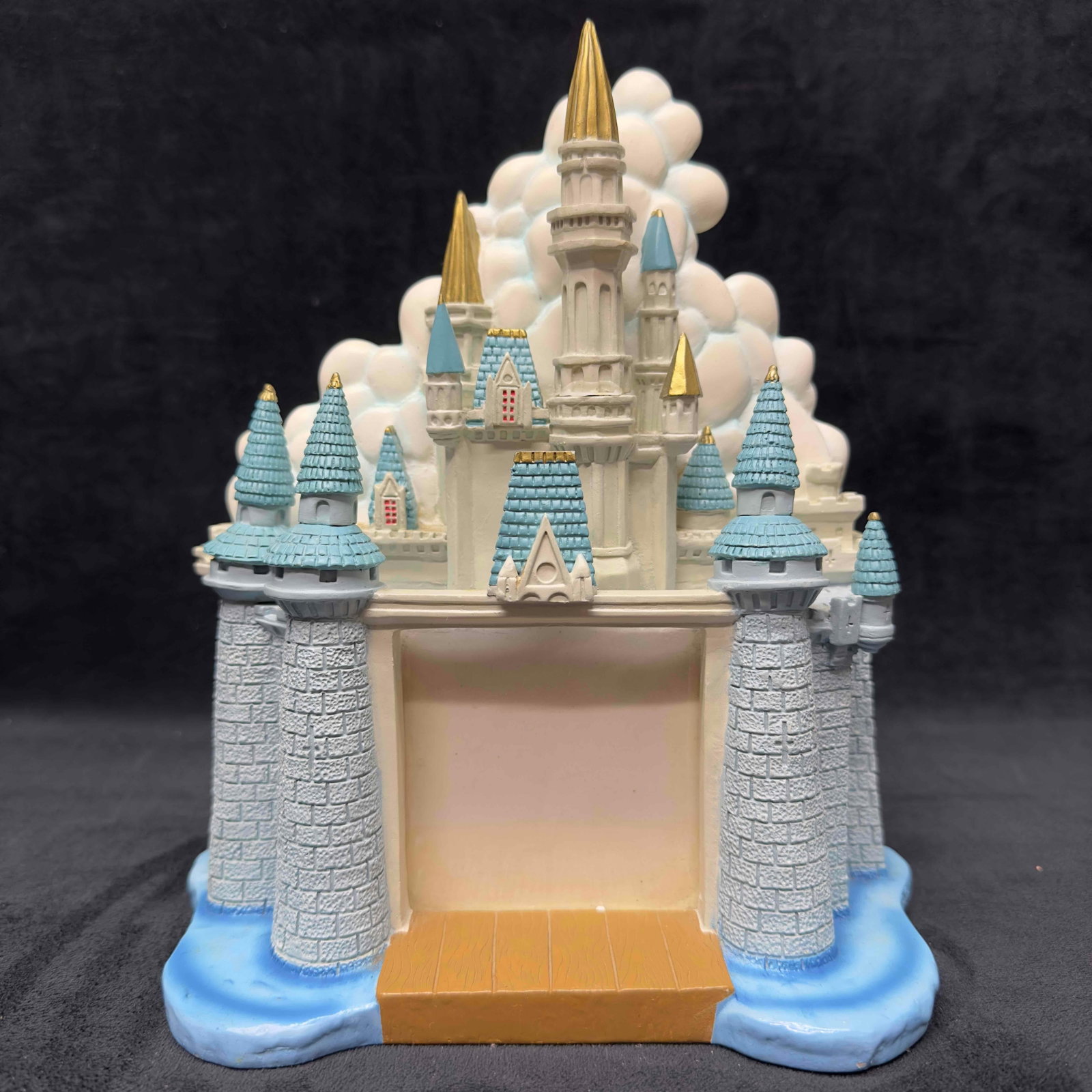 Walt Disney World Cinderella Castle 3D Ceramic Photo Frame Broken #2: Walt Disney World Cinderella Castle 3D Ceramic Photo Frame Broken #2. The center main castle turret had a clean break, has been repaired, a few minor chips. Photo size 3 x 3”. Light dust due to