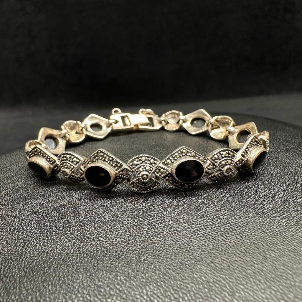Sterling Silver Marcasite Enamel Link Bracelet: This piece of jewelry has been tested and researched prior to listing. Please view all our pictures they are part of our description. DETAILS: Metal - Sterling Silver Color - Silver Stones - none