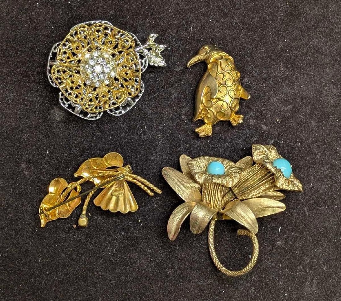 Vintage Napier J.J. German Floral And Penguin Brooch Pin Lot Of 4: Vintage Napier J.J. German Floral And Penguin Brooch Pin Lot Of 4. The lot includes: (1) J.J. Gold Tone Penquin Brooch. This is approx 2" x 1" x 1/4". (1) Made In East Germany Gold Tone AB